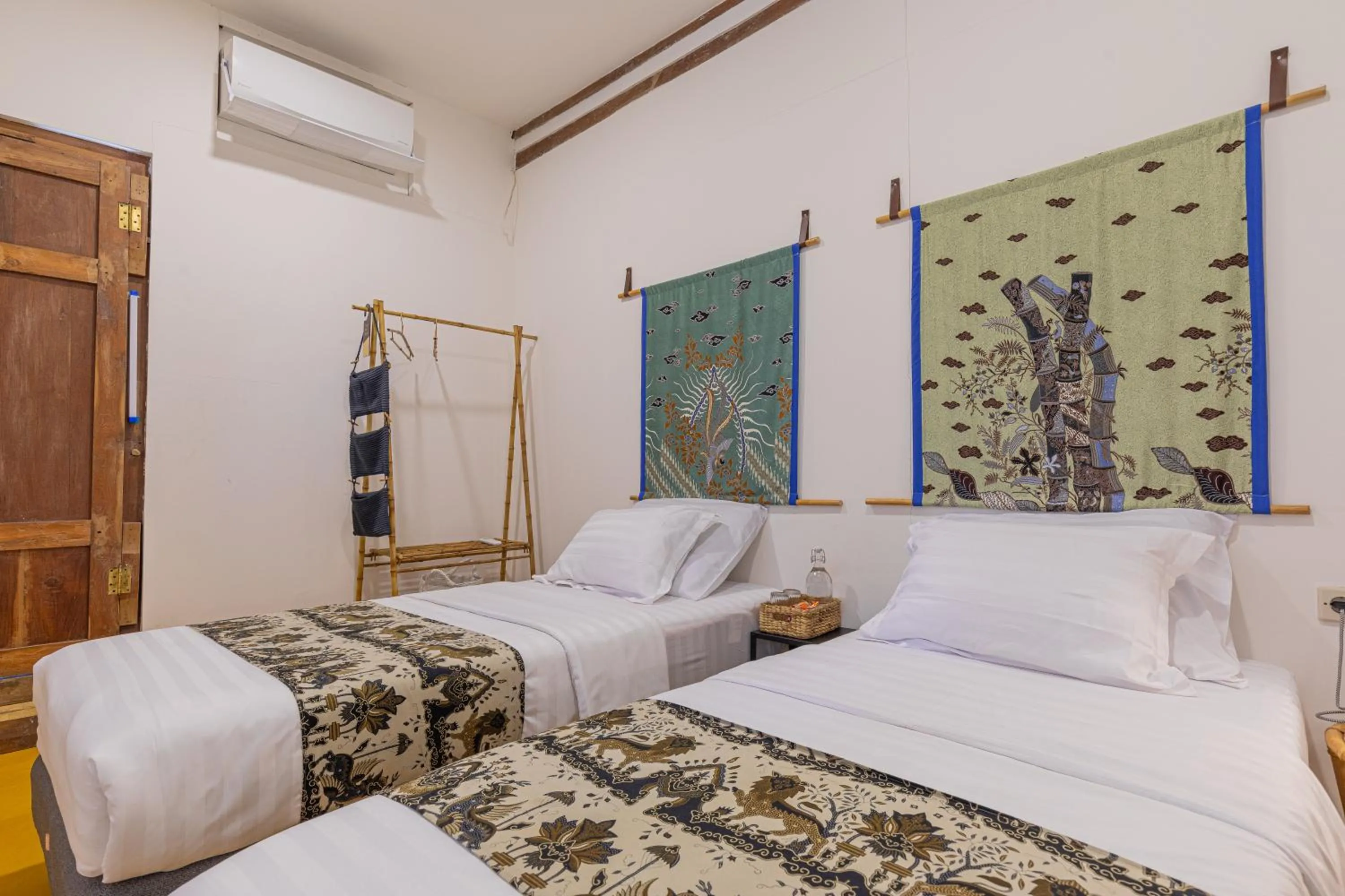 Bed in Yukke Tembi Homestay