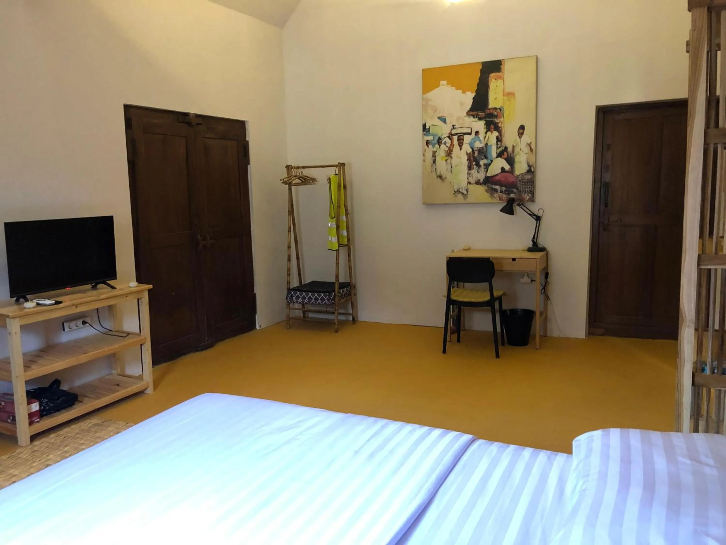 Bed in Yukke Tembi Homestay