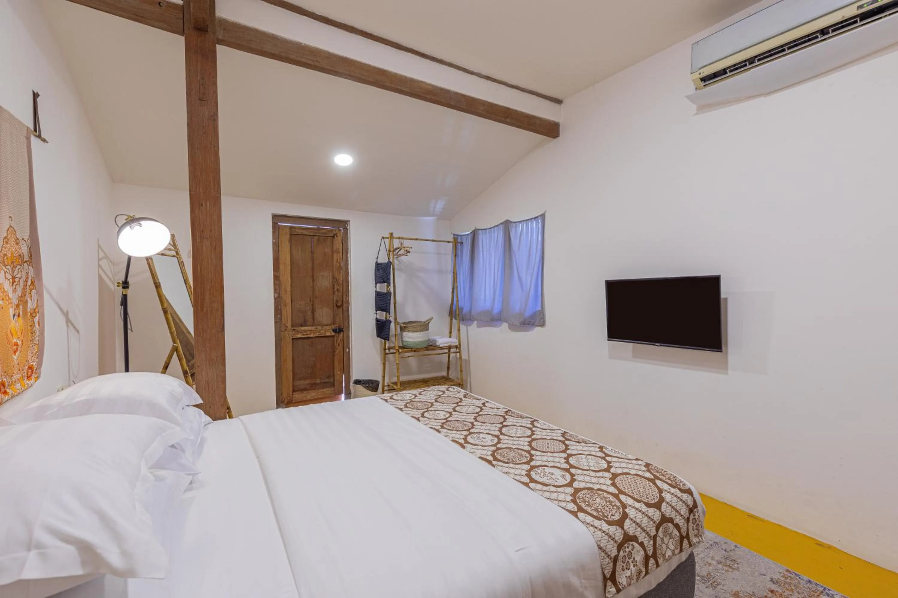 Bed in Yukke Tembi Homestay