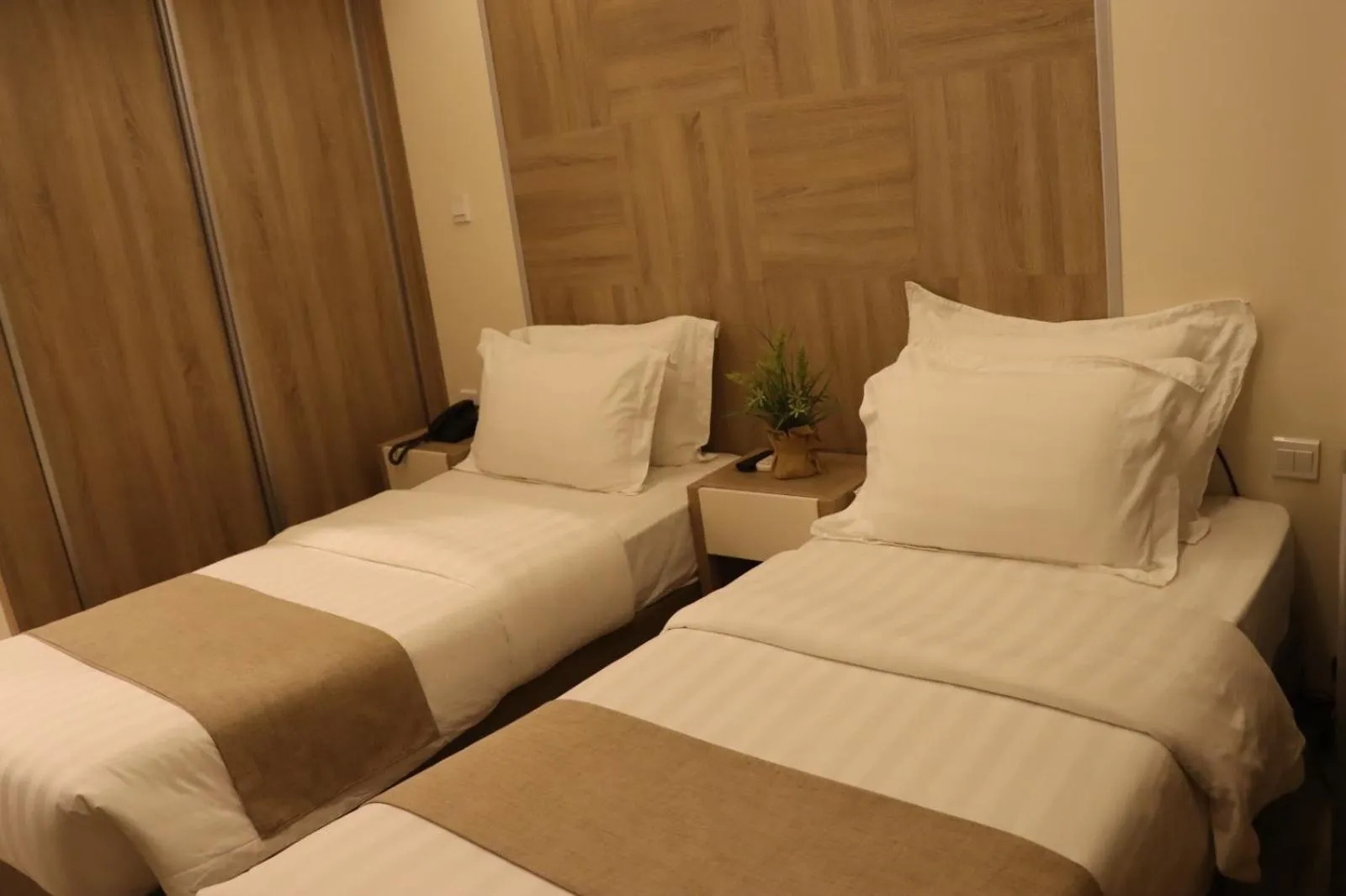 Bed in Alena Boutique Hotel