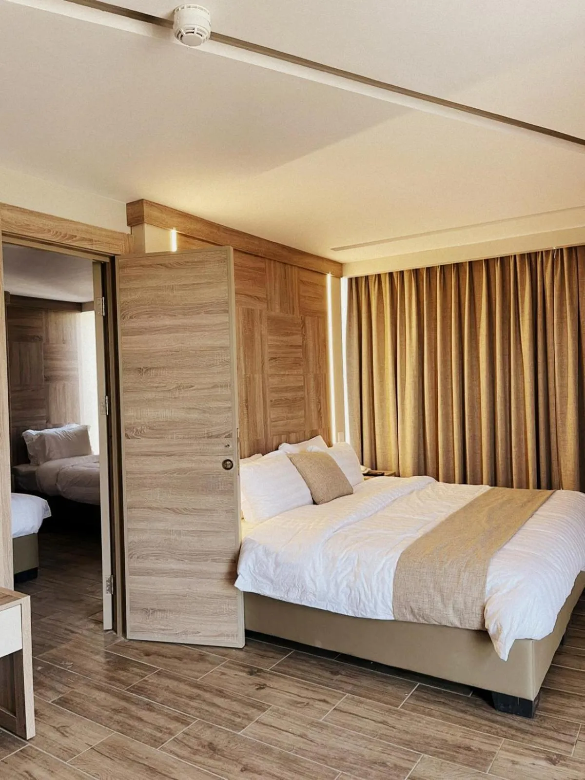 Bed in Alena Boutique Hotel