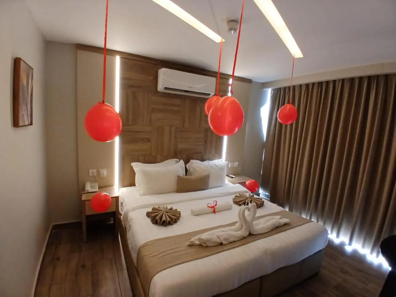 Bed in Alena Boutique Hotel