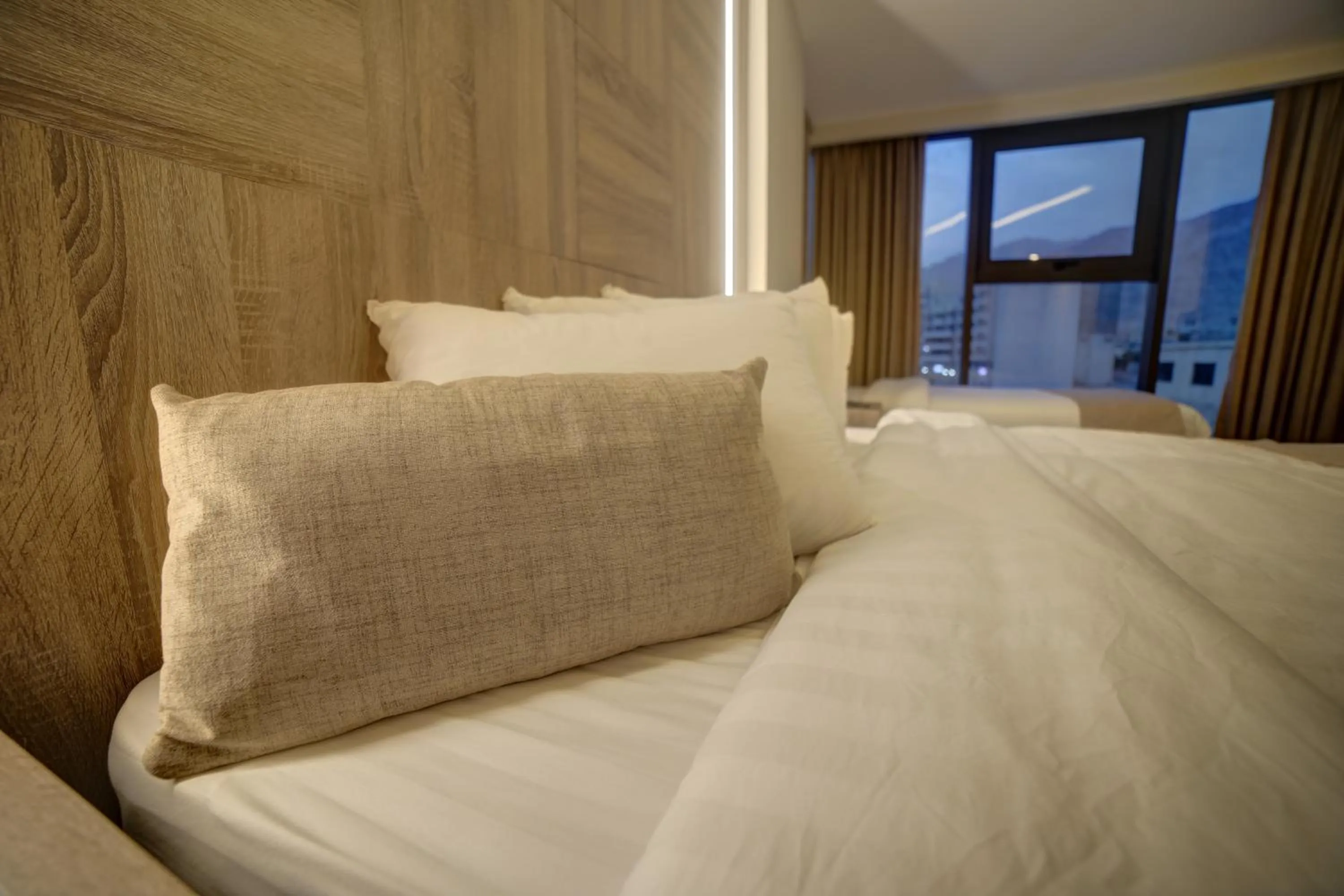 Bed in Alena Boutique Hotel