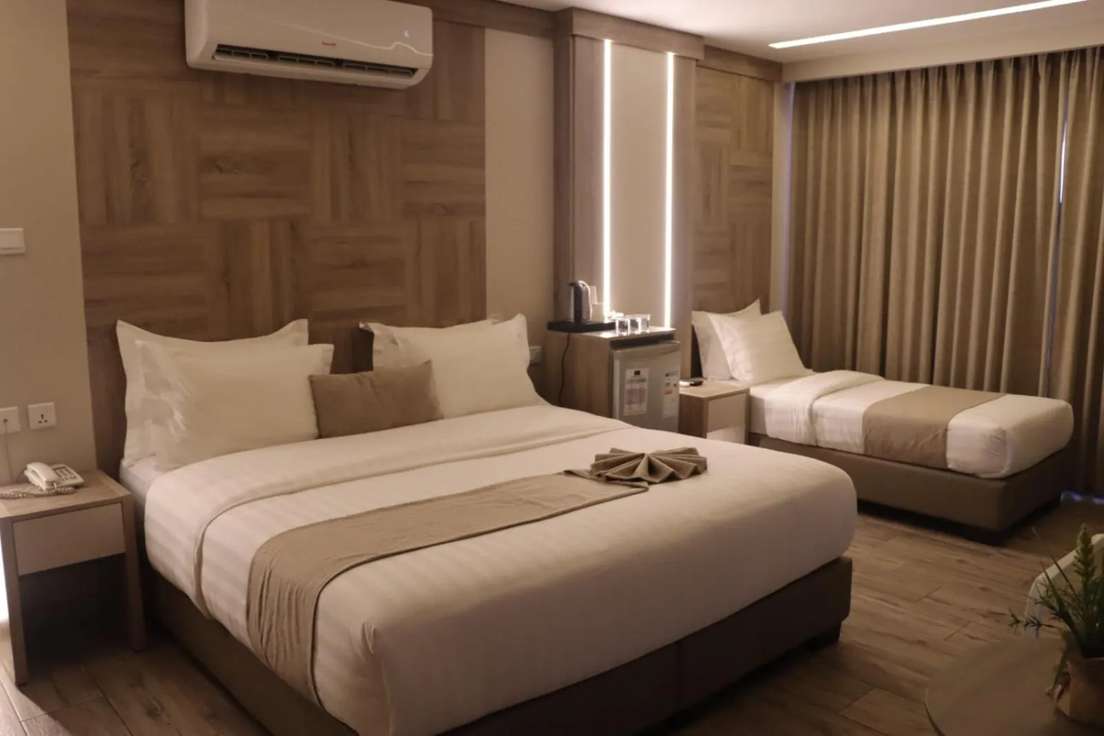 Bed in Alena Boutique Hotel