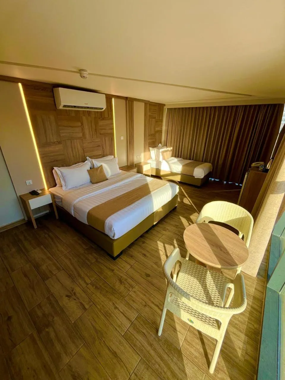 Bed in Alena Boutique Hotel