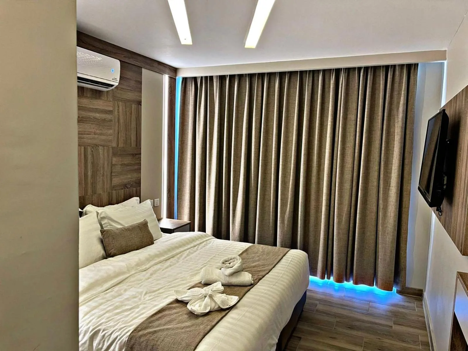 Bed in Alena Boutique Hotel