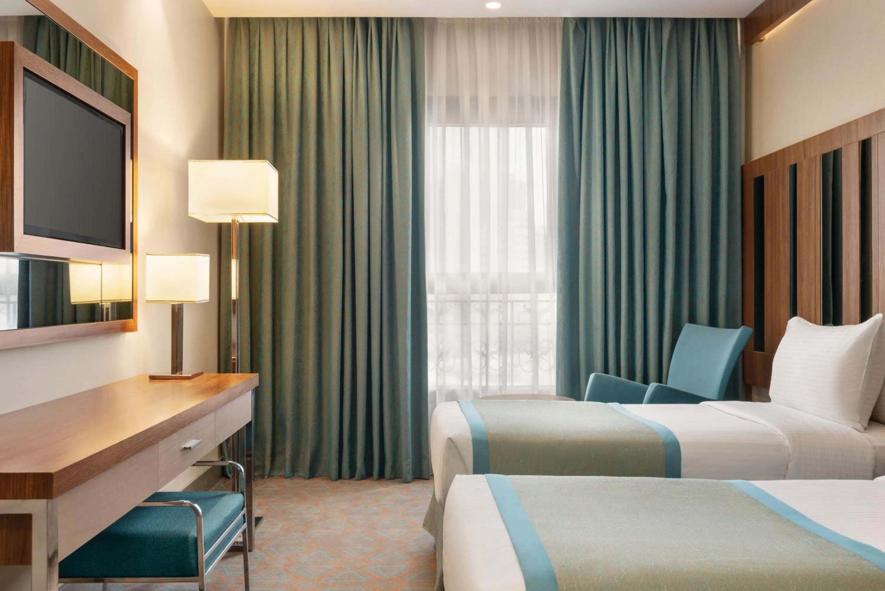 Bed in Ramada by Wyndham Makkah Zad Al Tayseer