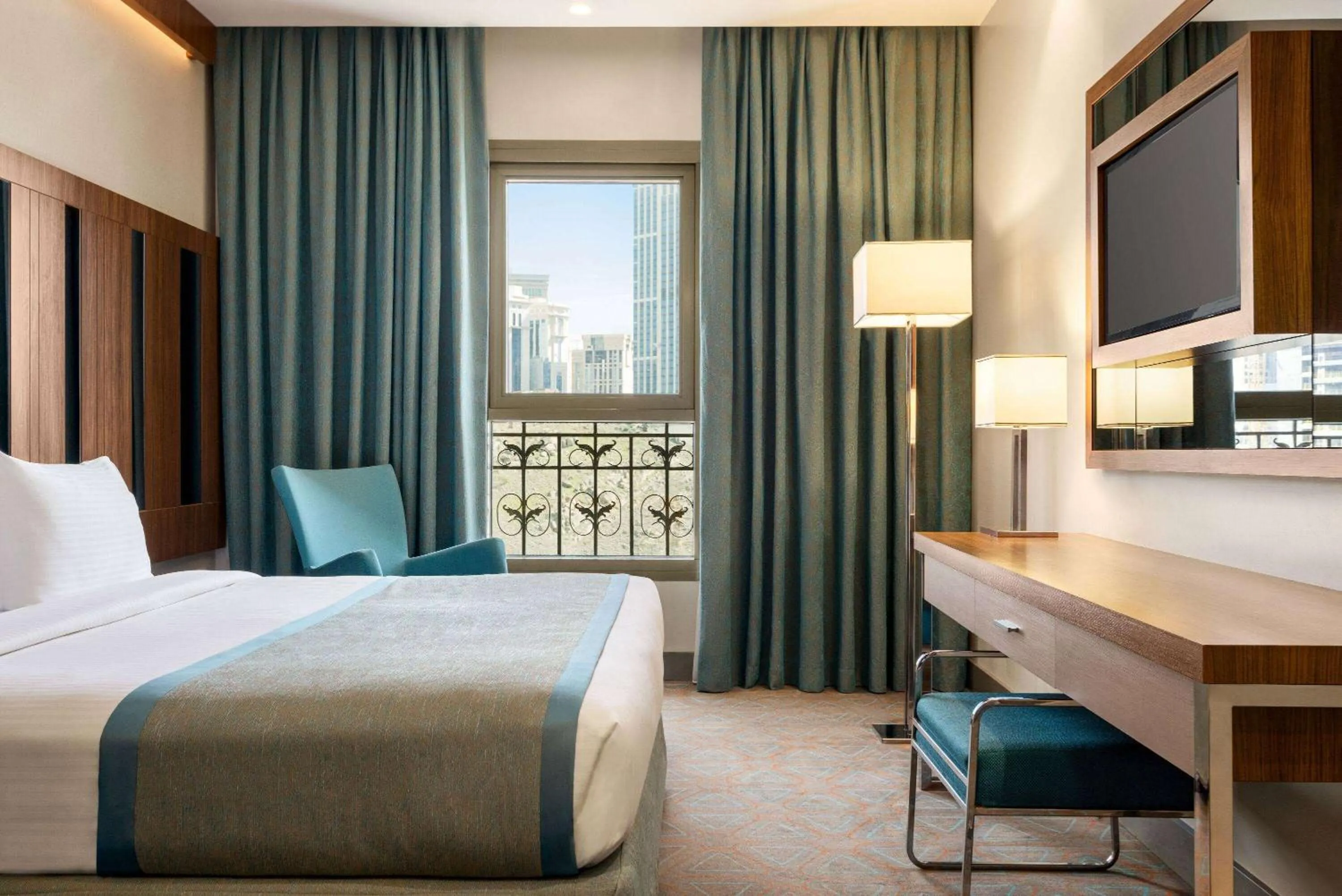 Photo of the whole room, Bed in Ramada by Wyndham Makkah Zad Al Tayseer