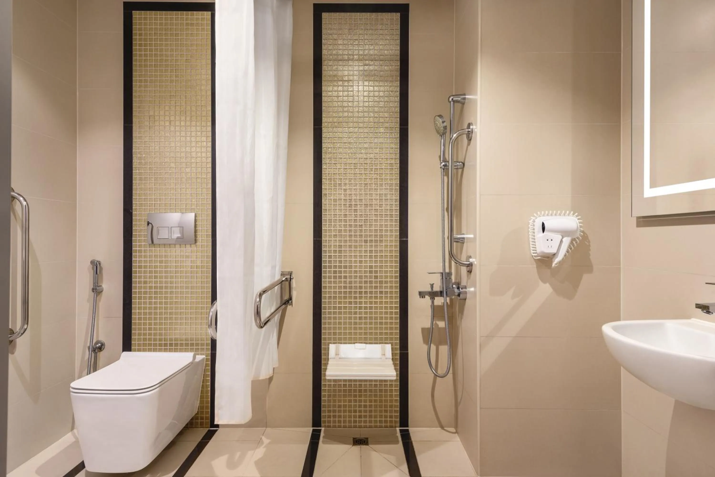 Bathroom in Ramada by Wyndham Makkah Zad Al Rawda