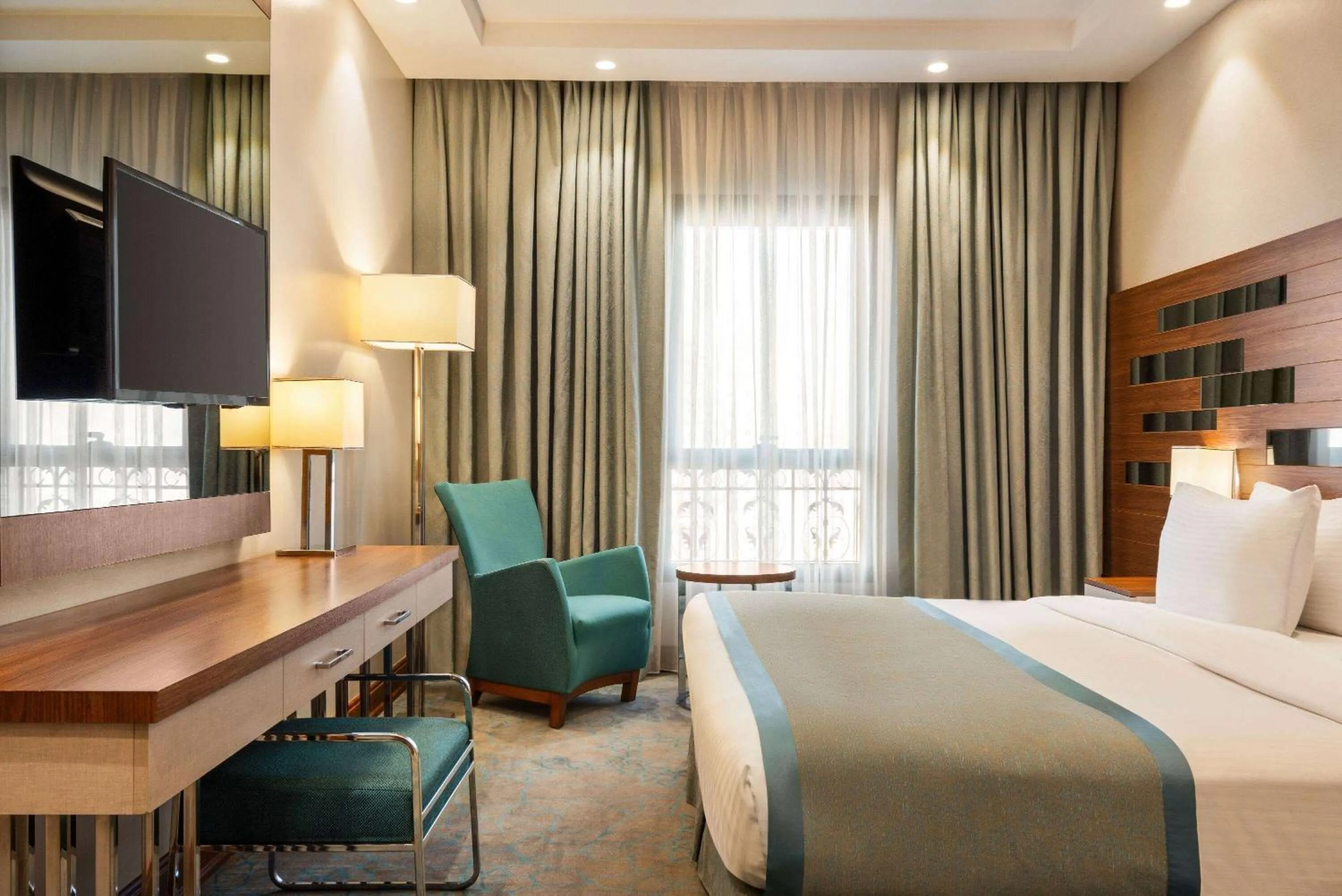 Bed in Ramada by Wyndham Makkah Zad Al Rawda