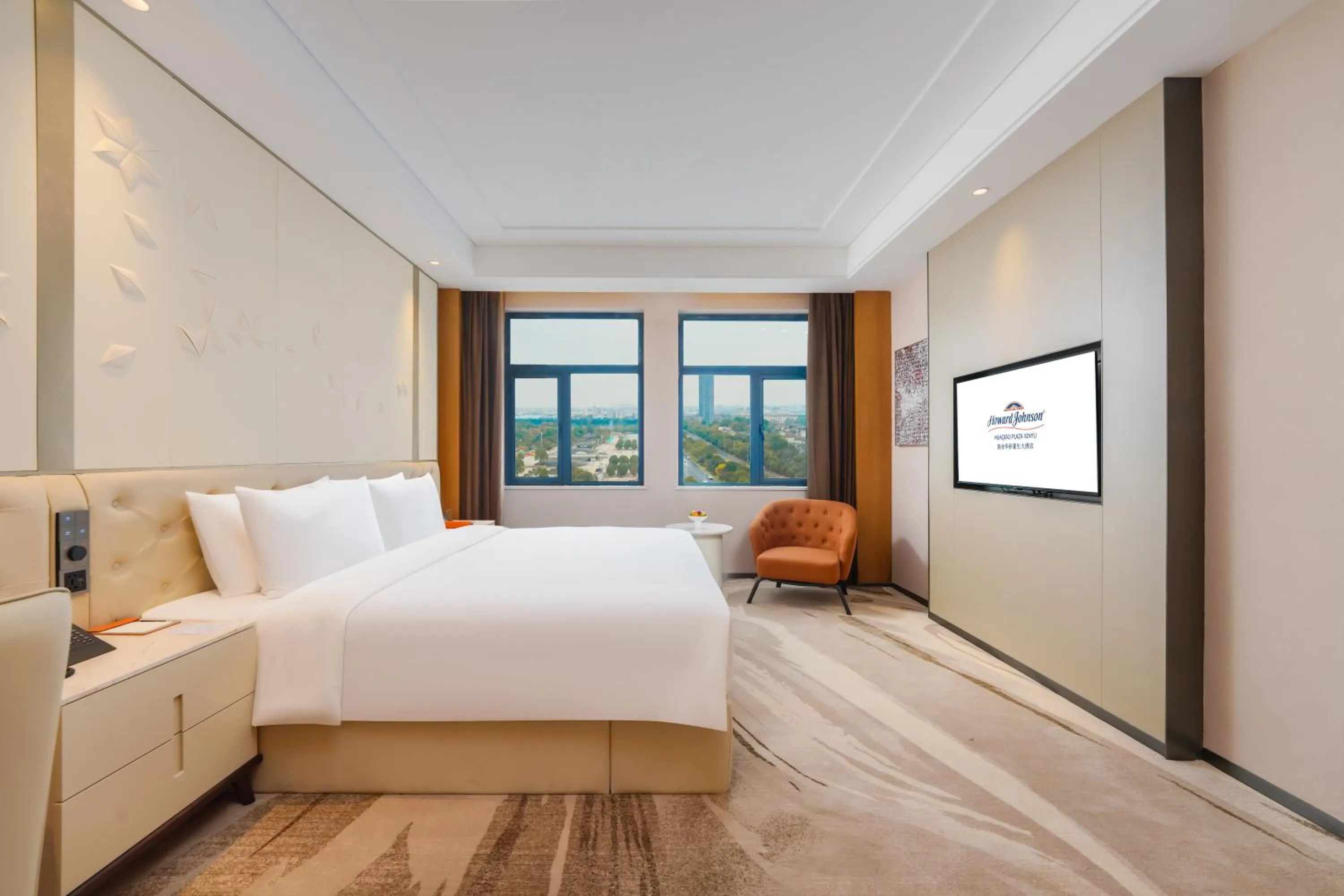 Bed in Howard Johnson by Wyndham Huaqiao Plaza Xinyu