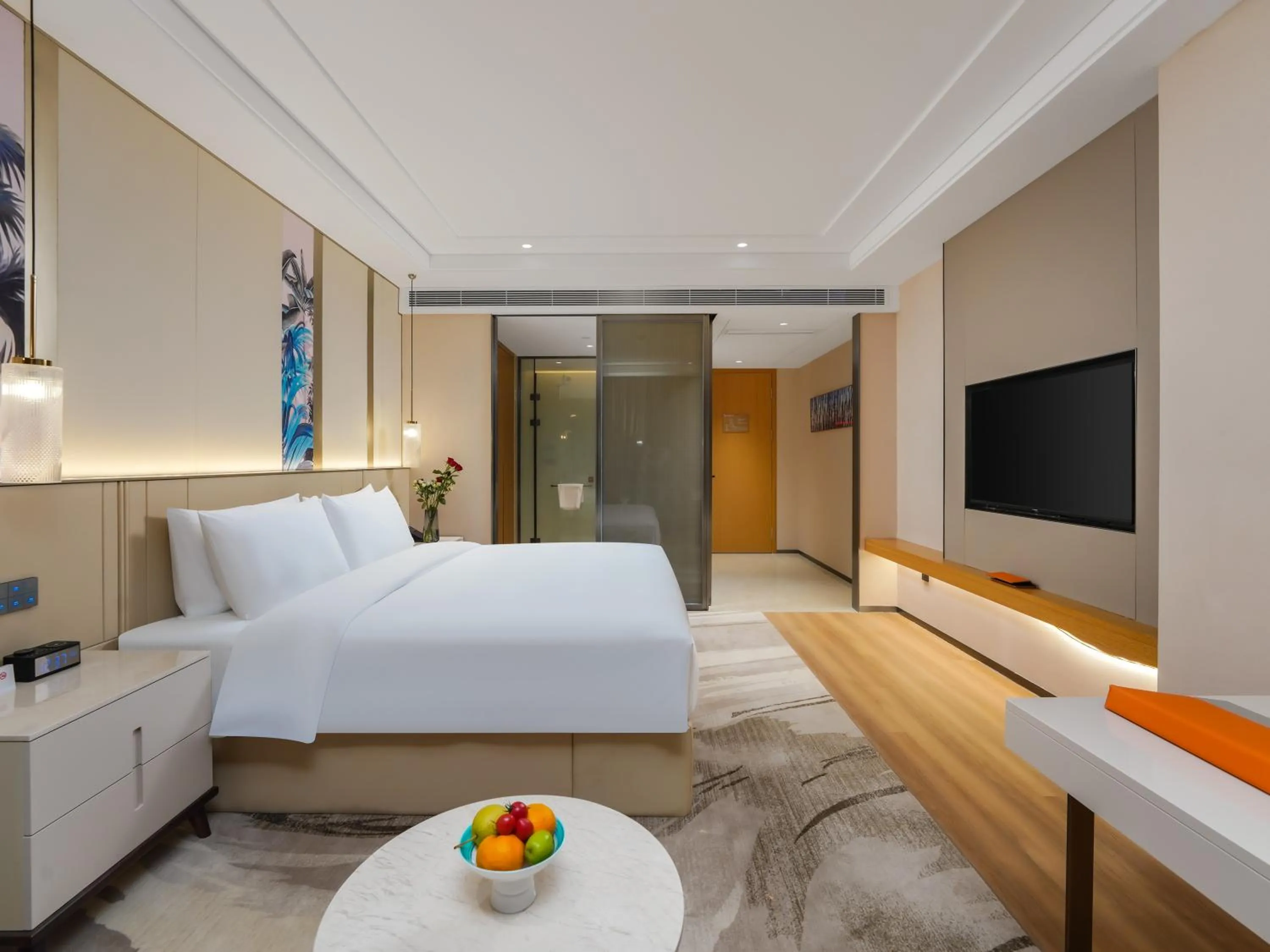 Bed in Howard Johnson by Wyndham Huaqiao Plaza Xinyu