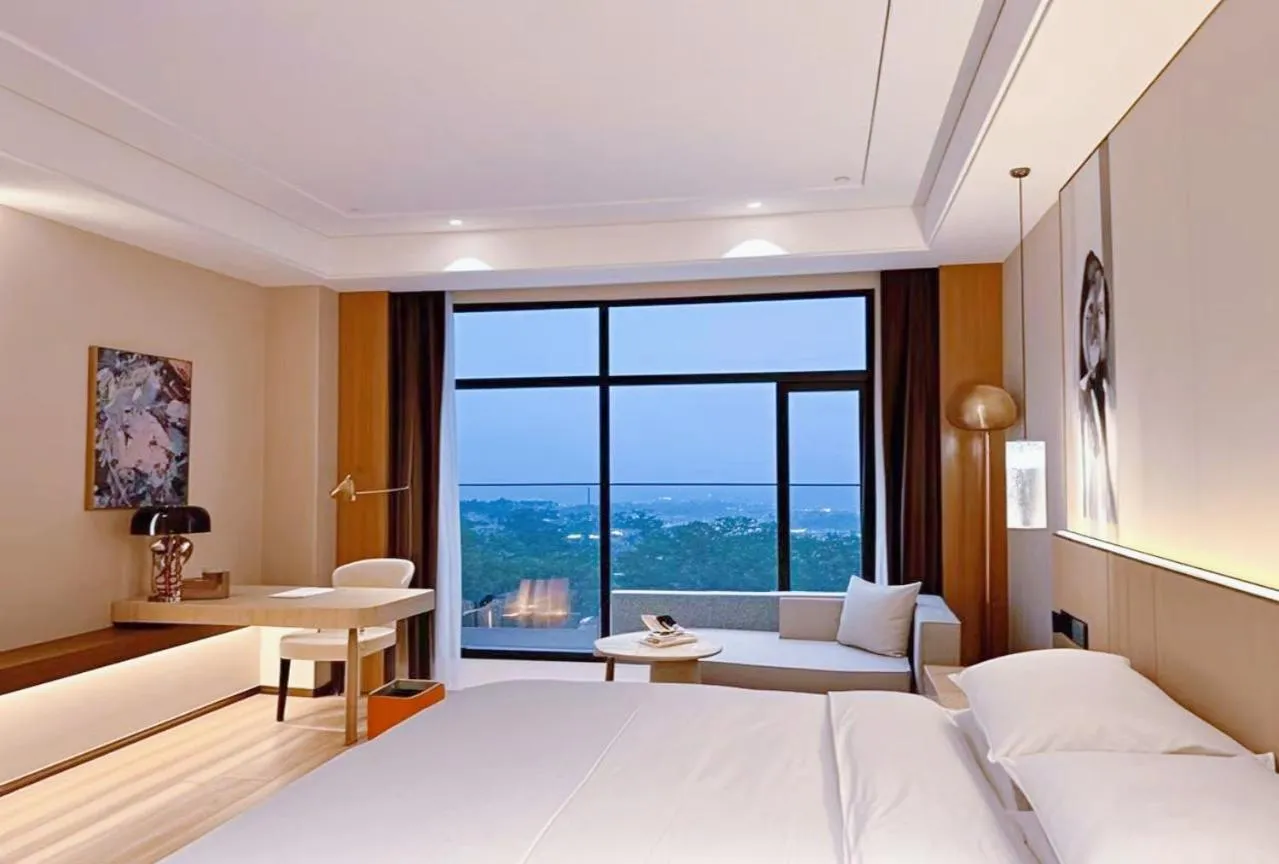 Bed in Howard Johnson by Wyndham Huaqiao Plaza Xinyu