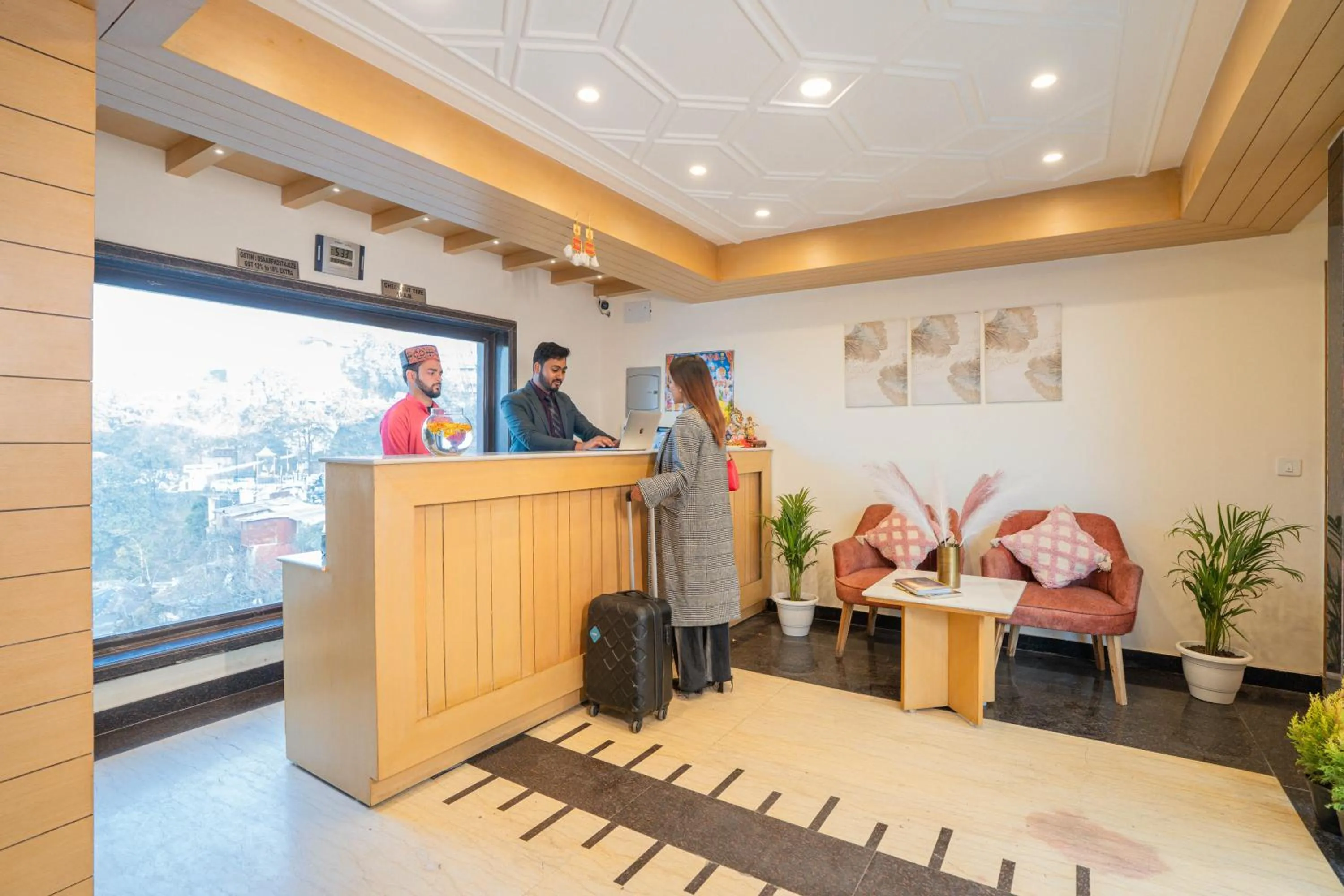 Staff in Super Hotel by Perfectstayz Mall Road