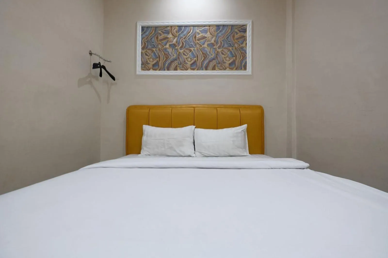 Bed in Grand Mulia Hotel Kisaran