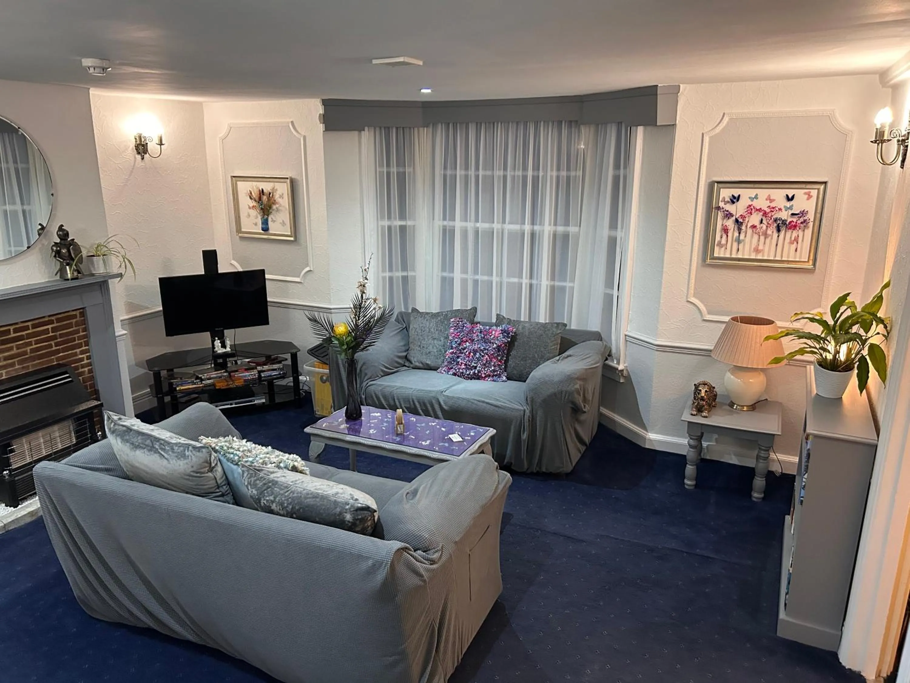 Communal lounge/ TV room in The Beaumont