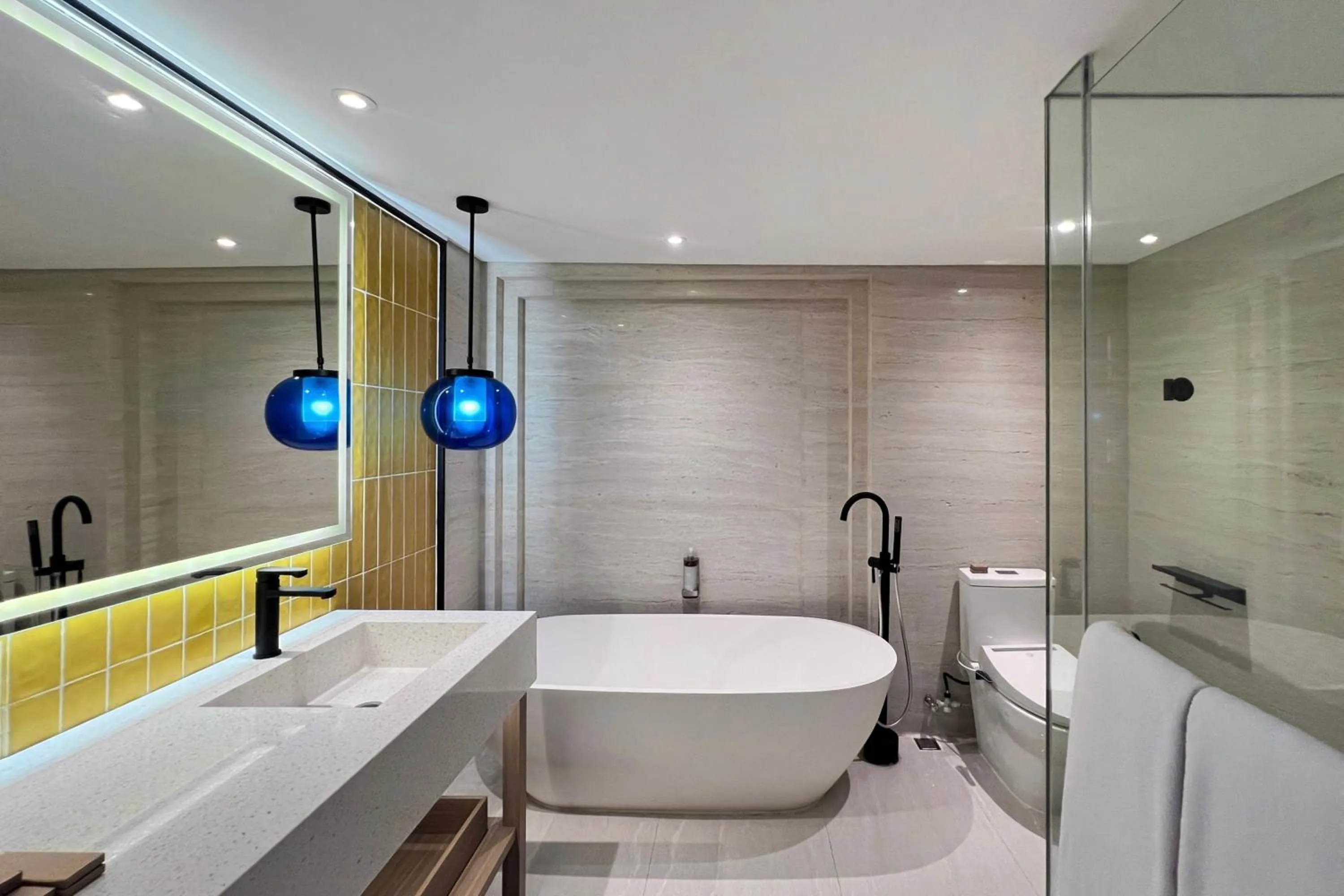 Toilet in voco Bali Seminyak by IHG