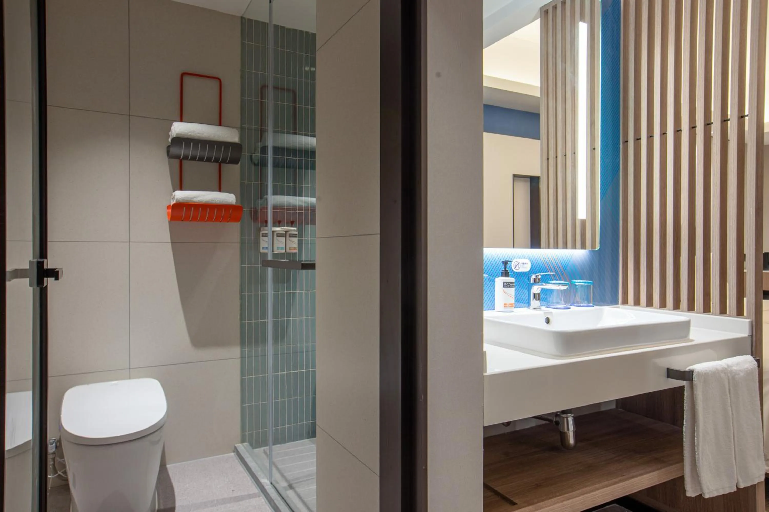 Toilet in Holiday Inn Express Shanghai Gumei by IHG