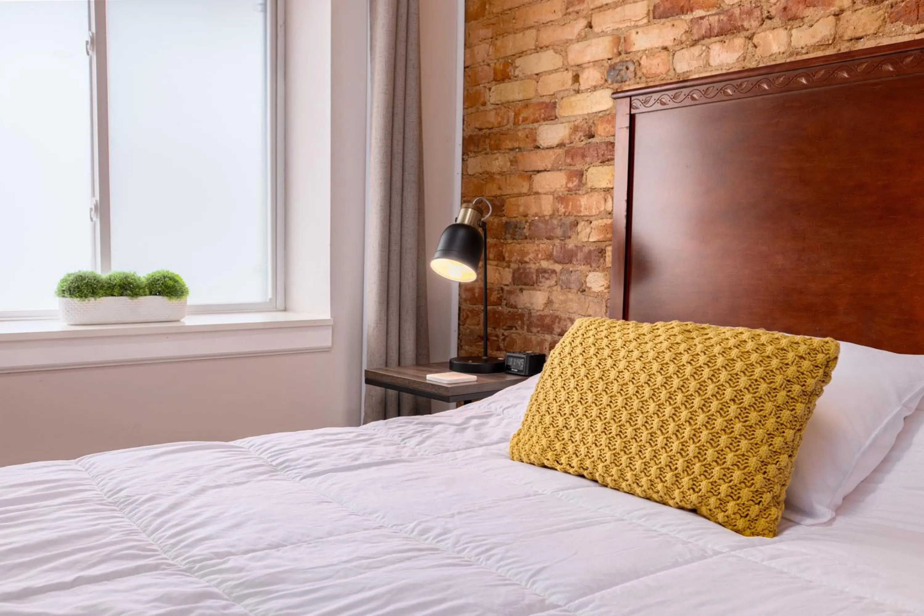Bed in Hartwell Suites