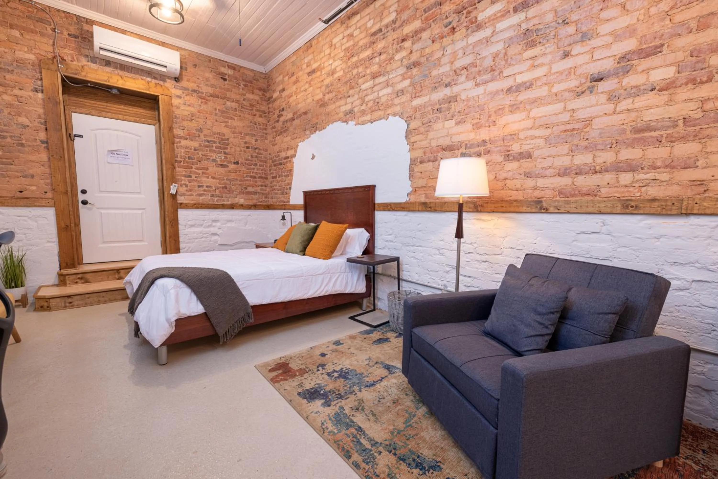 Bed in Hartwell Suites
