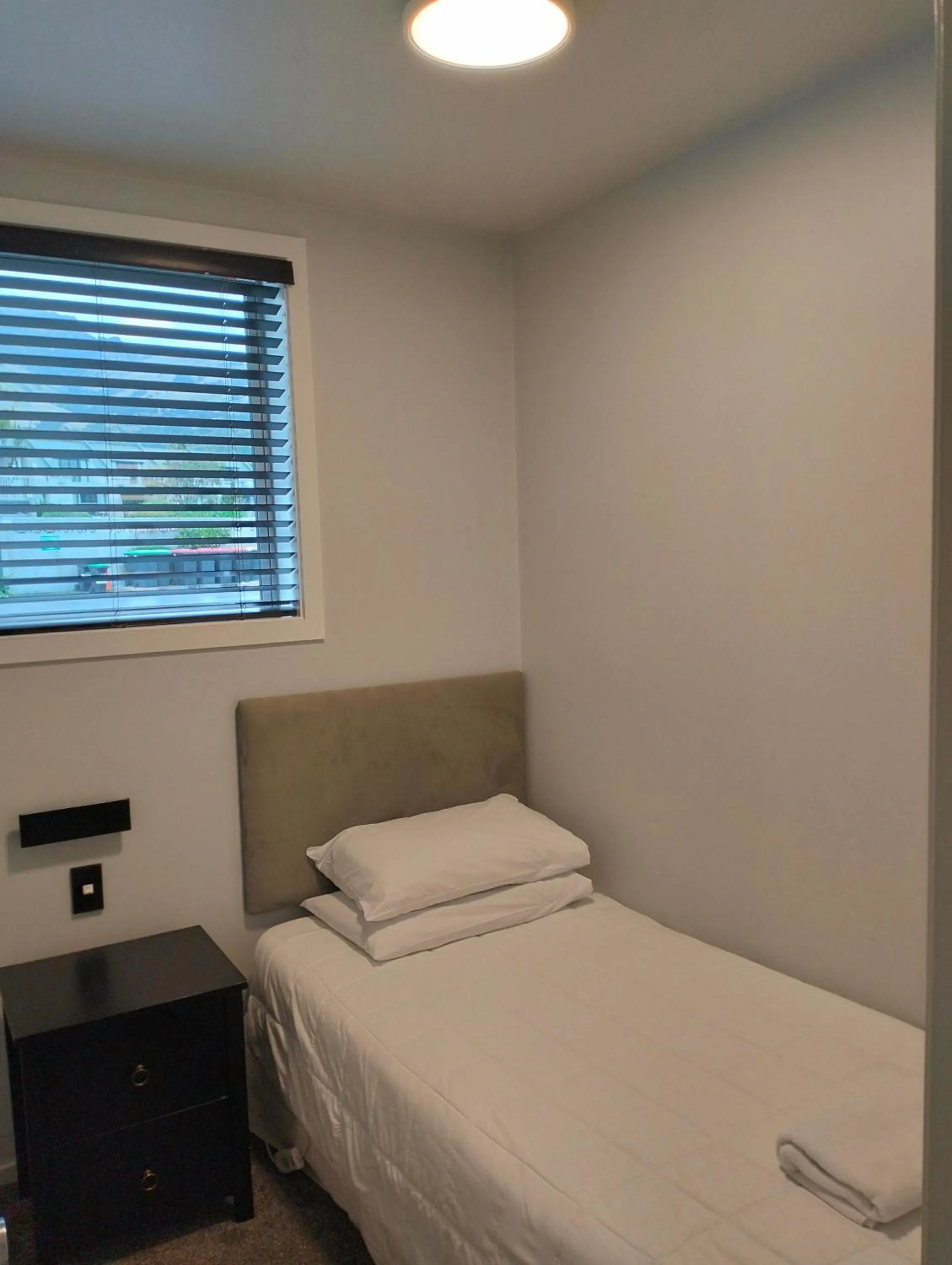 Bed in Akaroa Village Inn