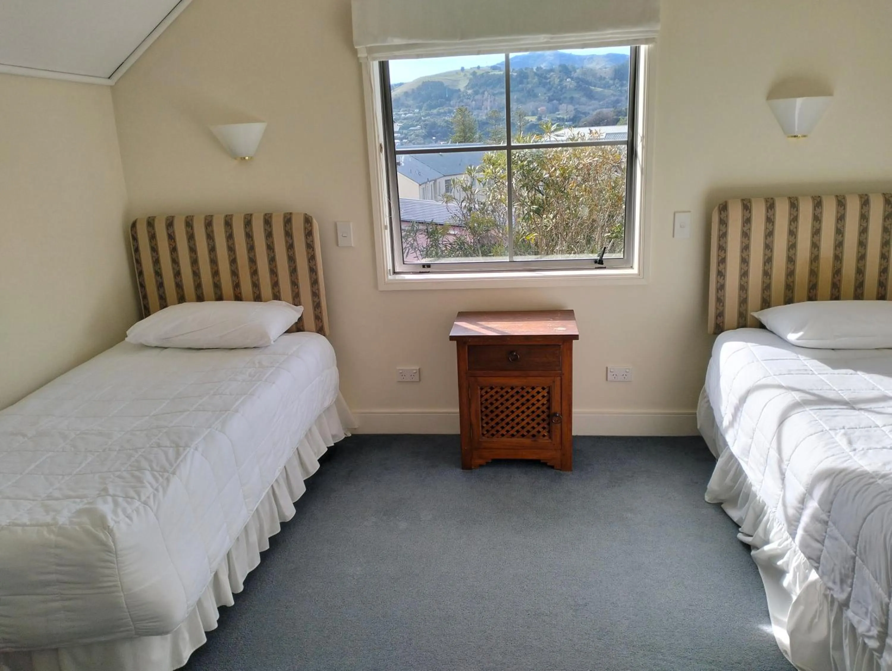 Bed in Akaroa Village Inn
