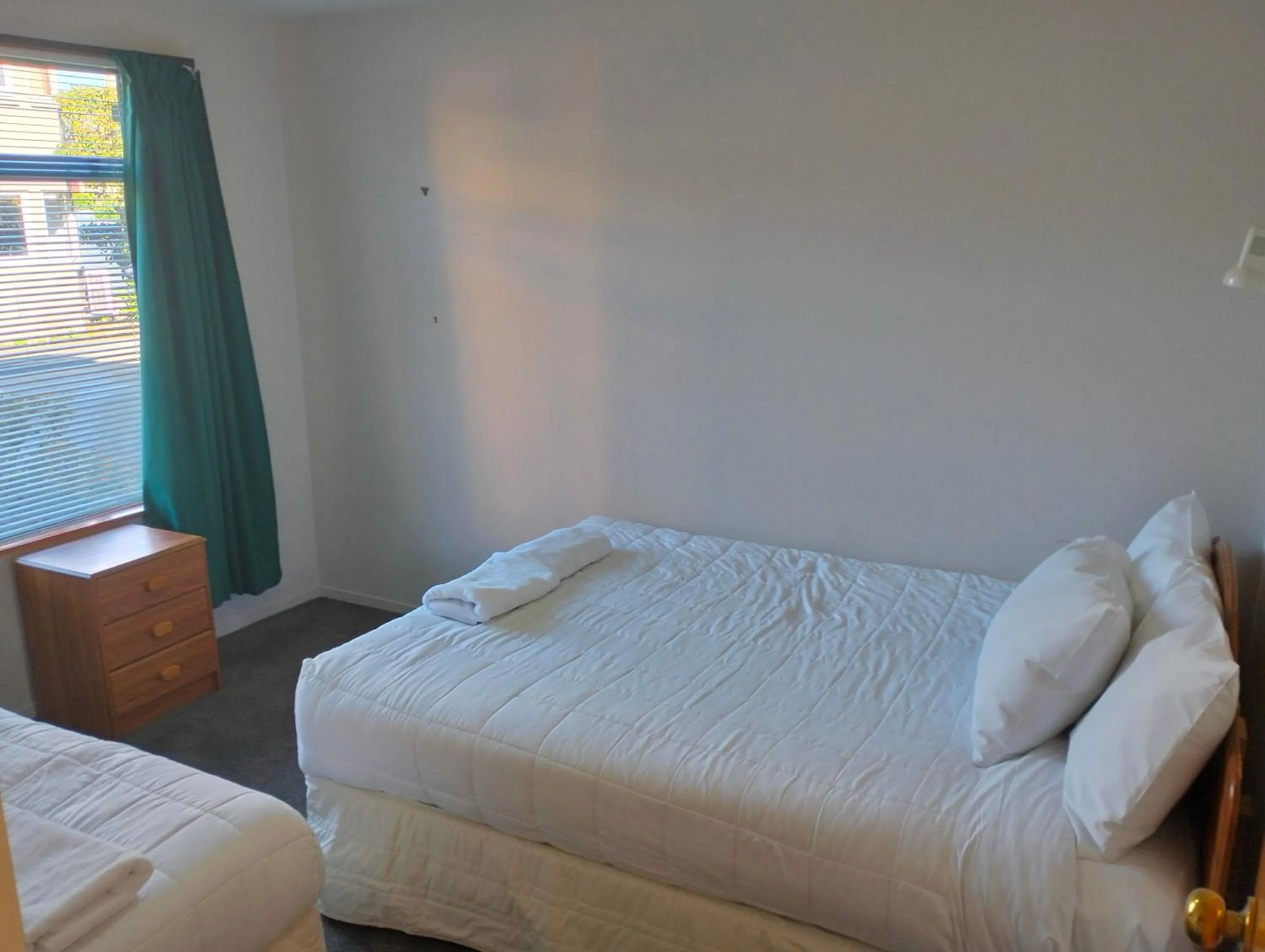 Bed in Akaroa Village Inn