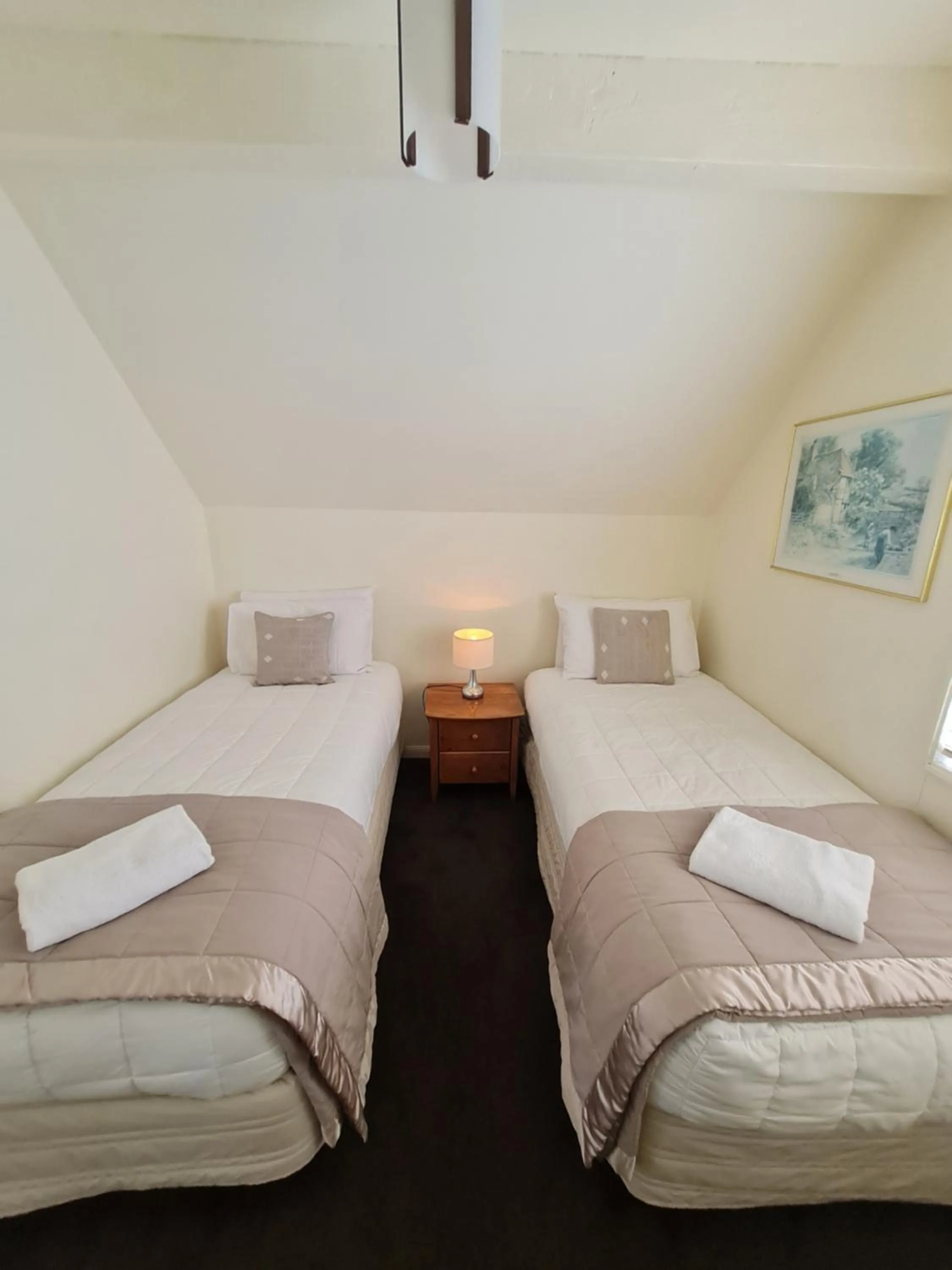 Bed in Akaroa Village Inn