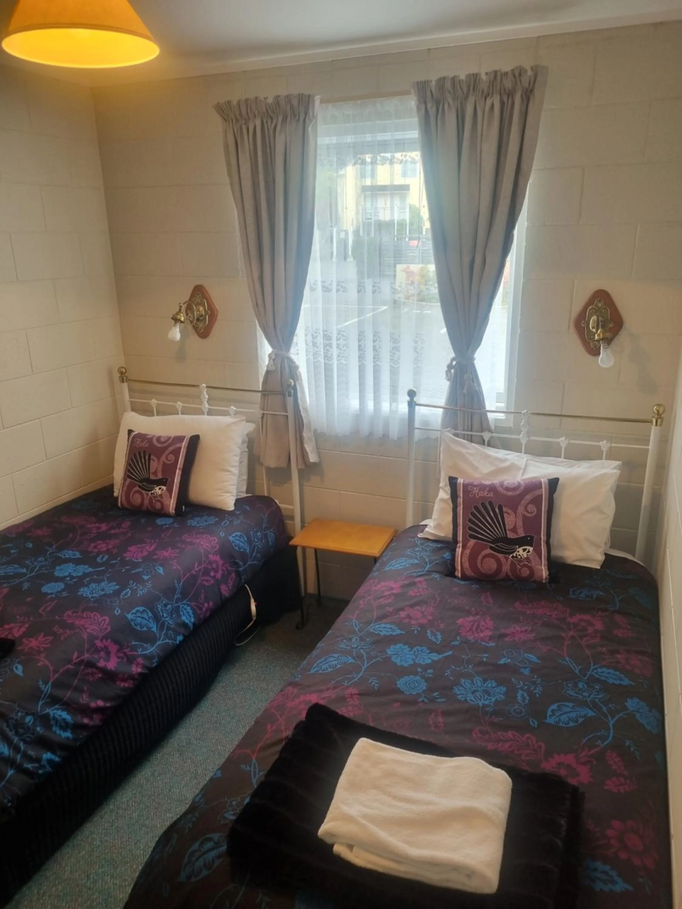 Bed in Akaroa Village Inn