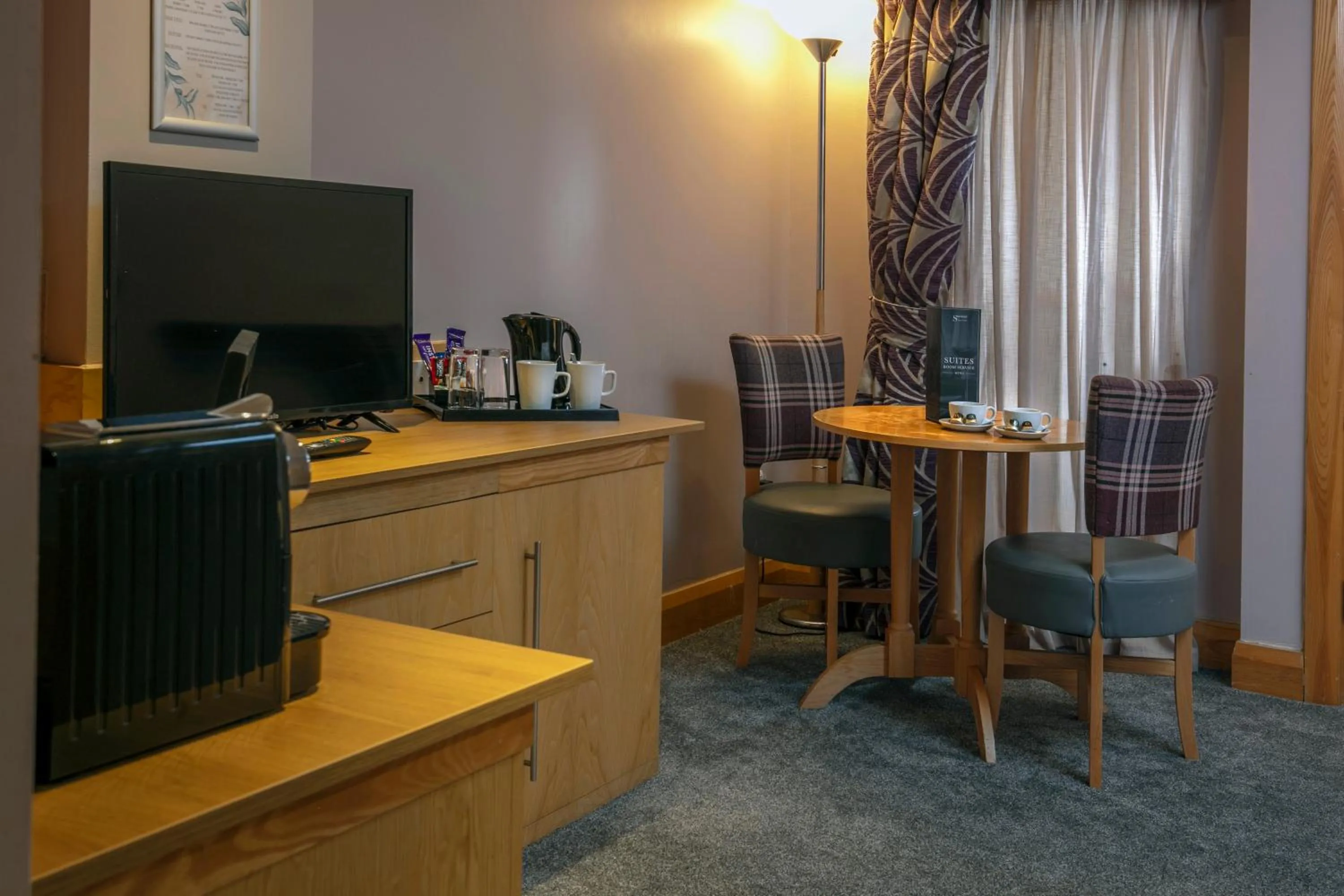 TV and multimedia in Best Western Premier Knowsley Suites Hotel & Spa