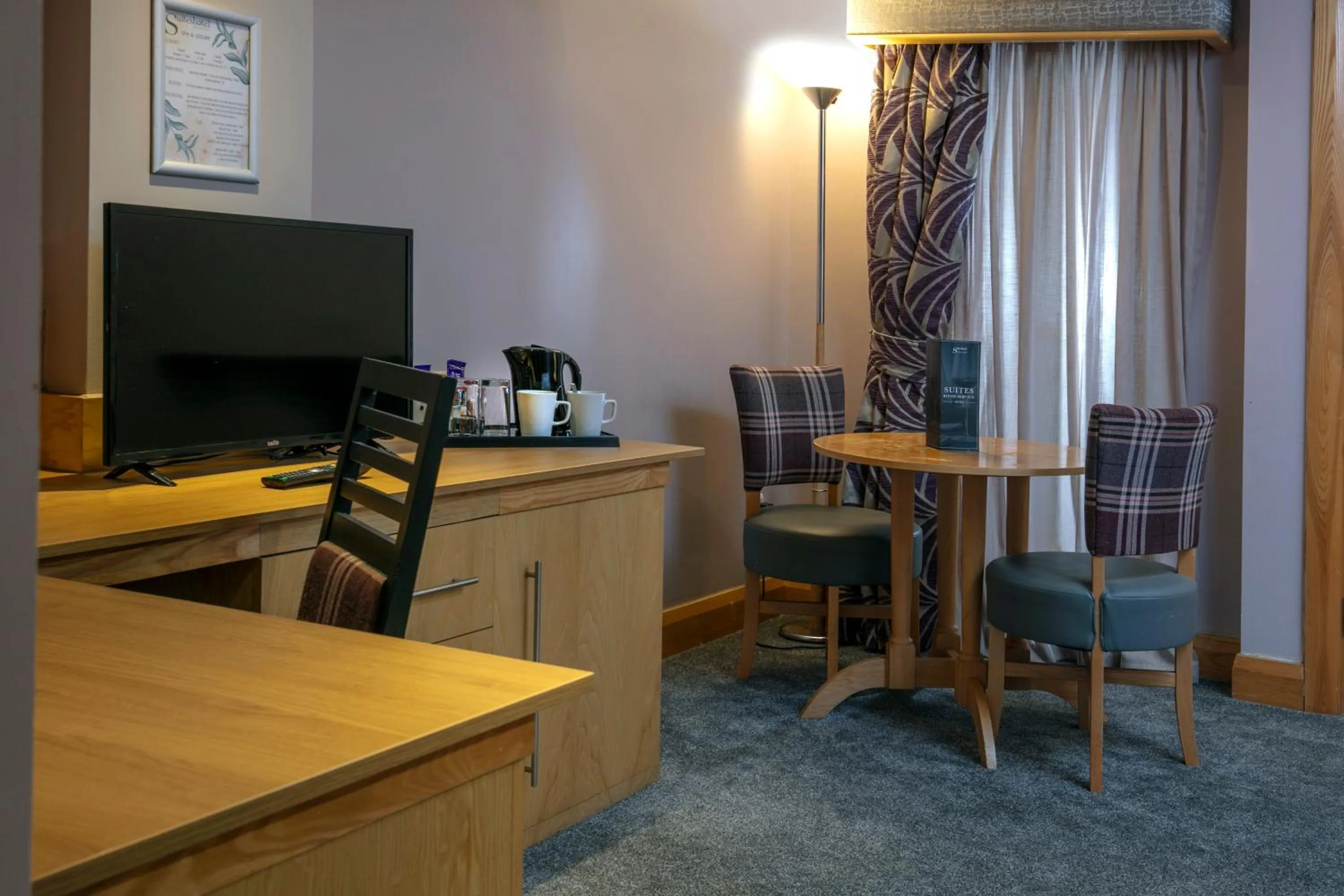 TV and multimedia in Best Western Premier Knowsley Suites Hotel & Spa
