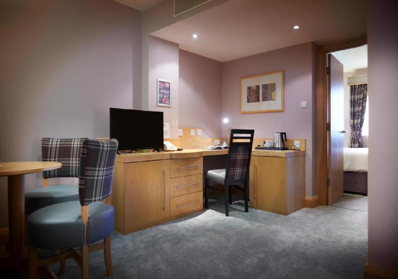 TV and multimedia in Best Western Premier Knowsley Suites Hotel & Spa