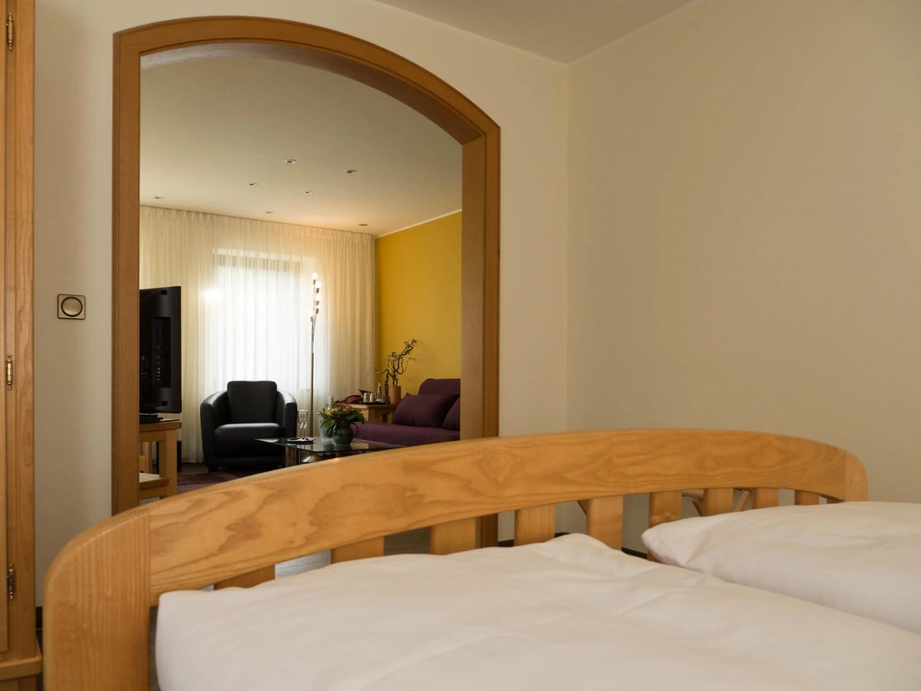 Living room, Bed in Hotel Landhaus Berghof