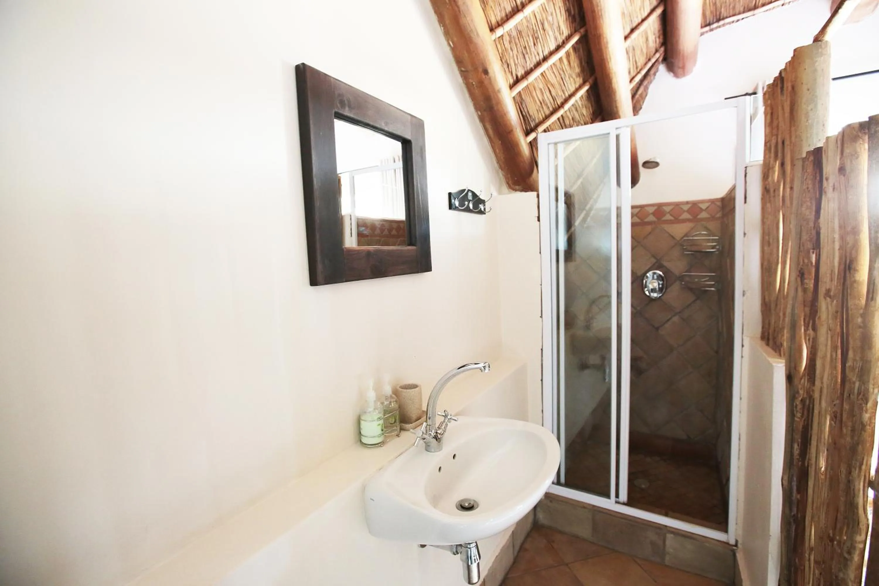 Bathroom in 19th Hole Golf Villa Guesthouse