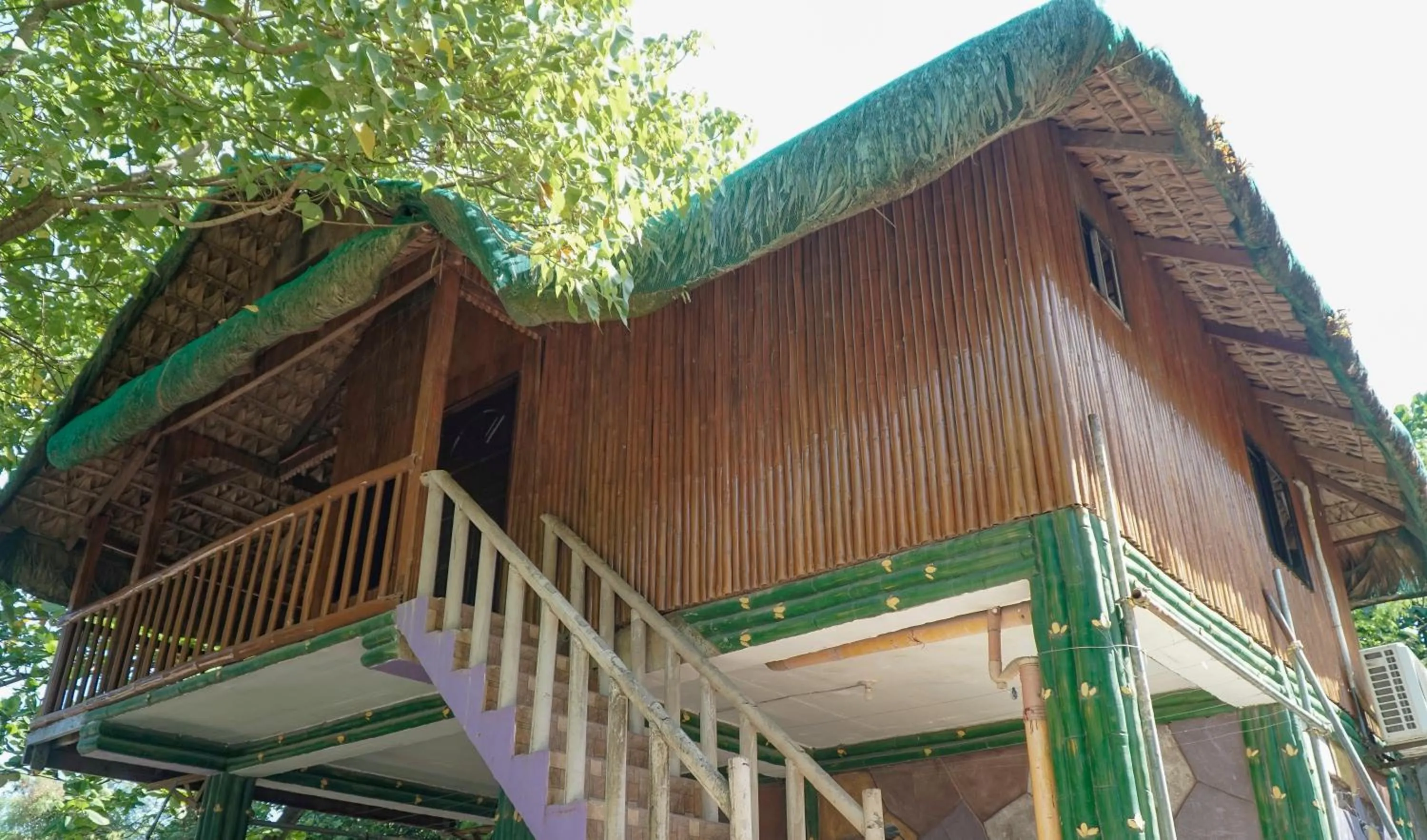 Property building in The Blessed Purple Bamboo Beach Resort