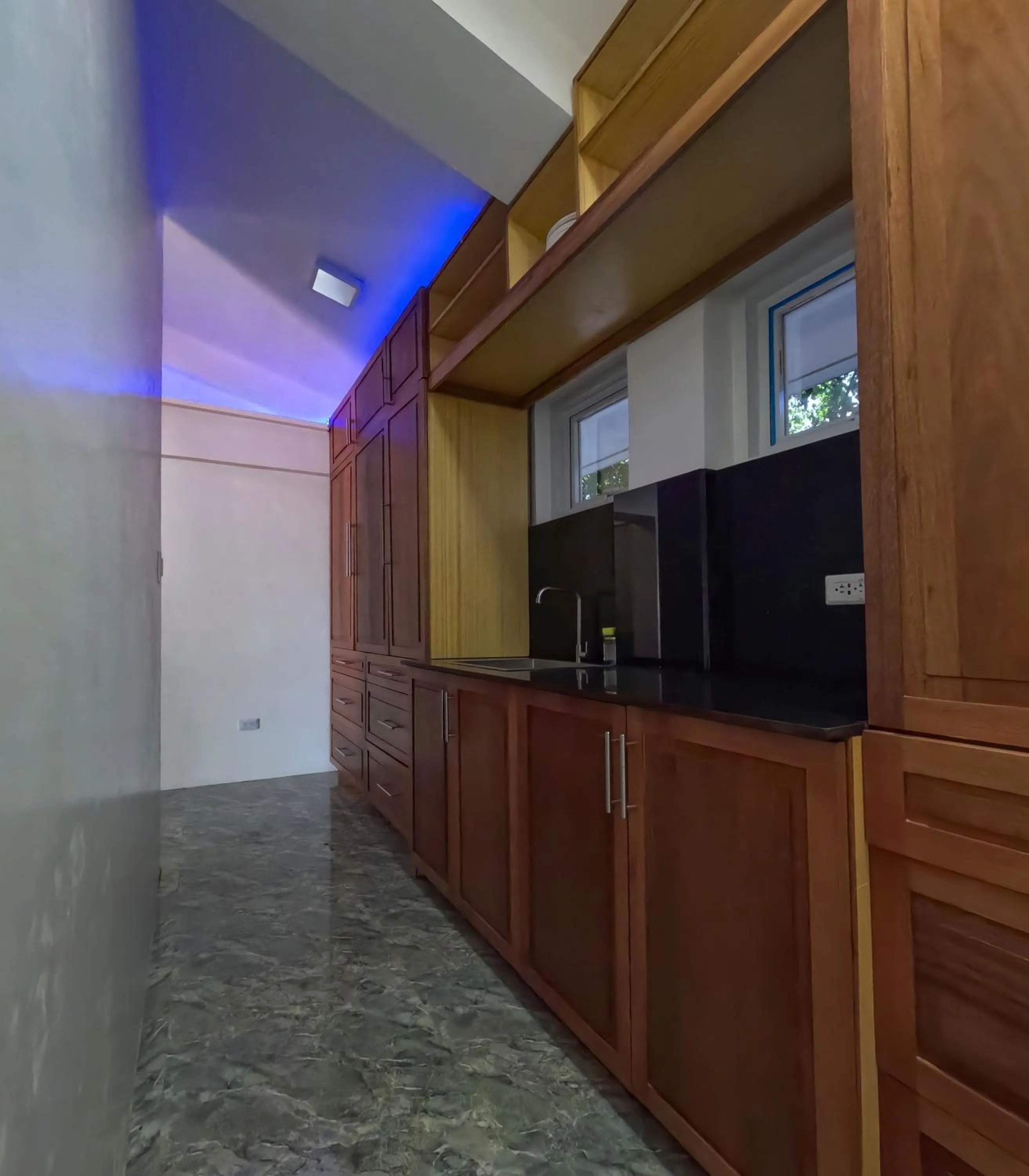 Kitchen or kitchenette in The Blessed Purple Bamboo Beach Resort