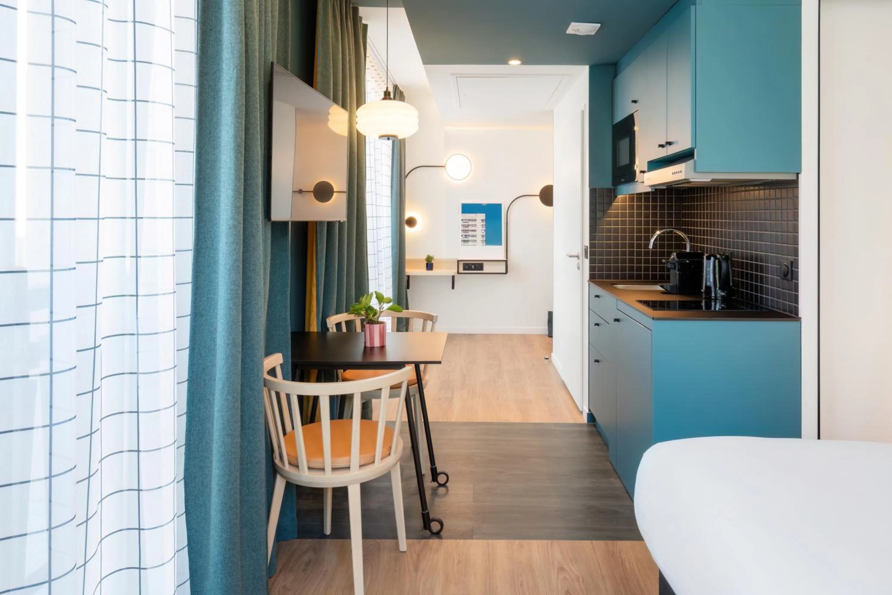 Kitchen or kitchenette in Aparthotel Adagio Access Rouen Centre Cathédrale