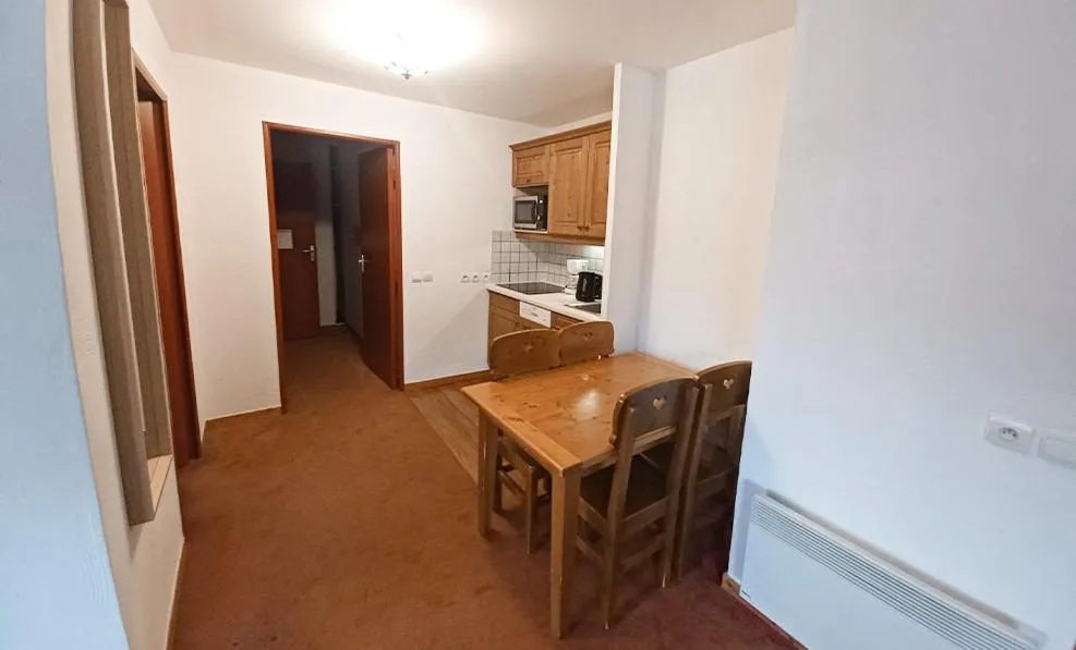 Dining area in Vacancéole - Résidence Les Chalets de la Ramoure