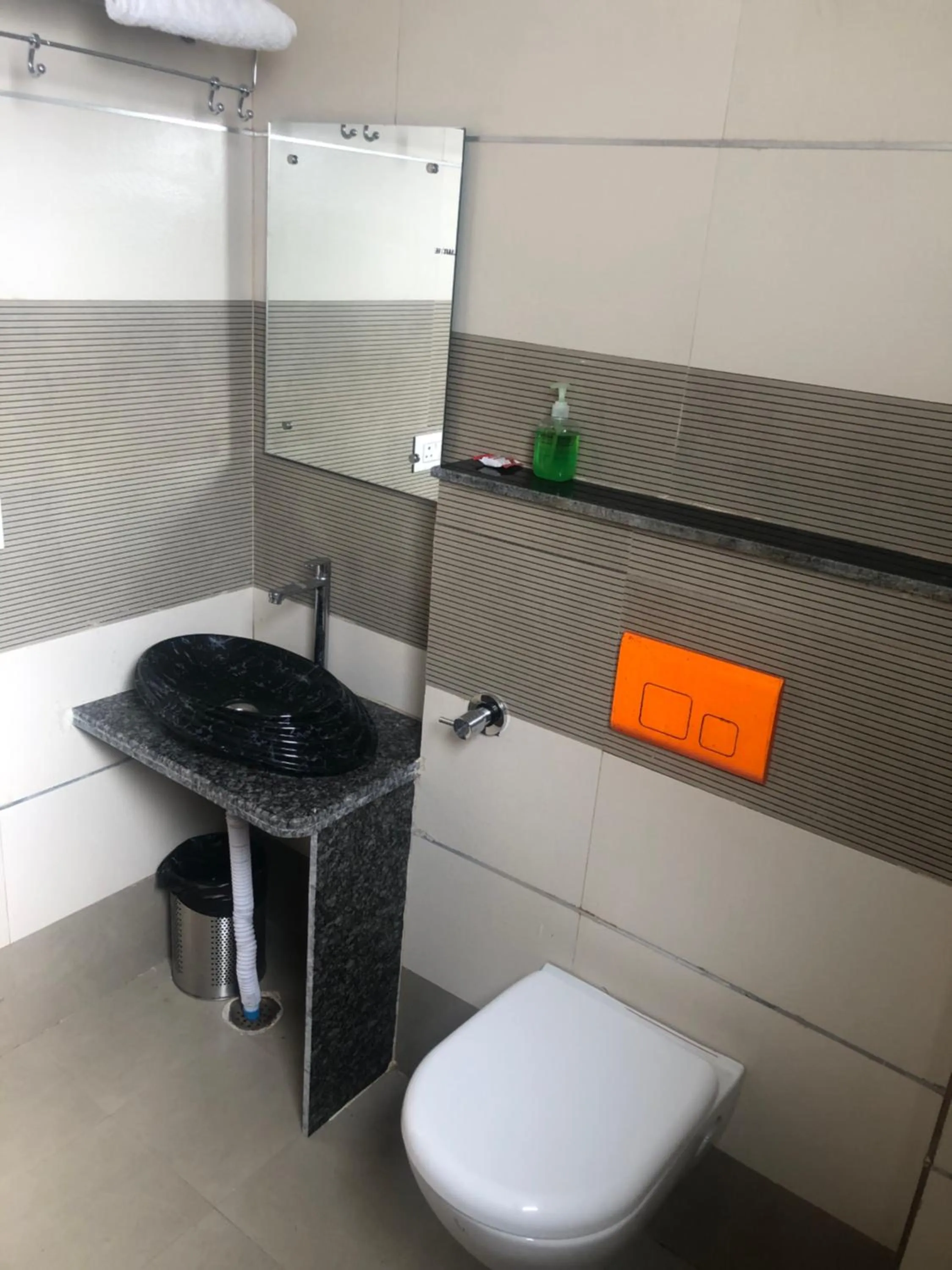 Toilet in C T Heights Inn