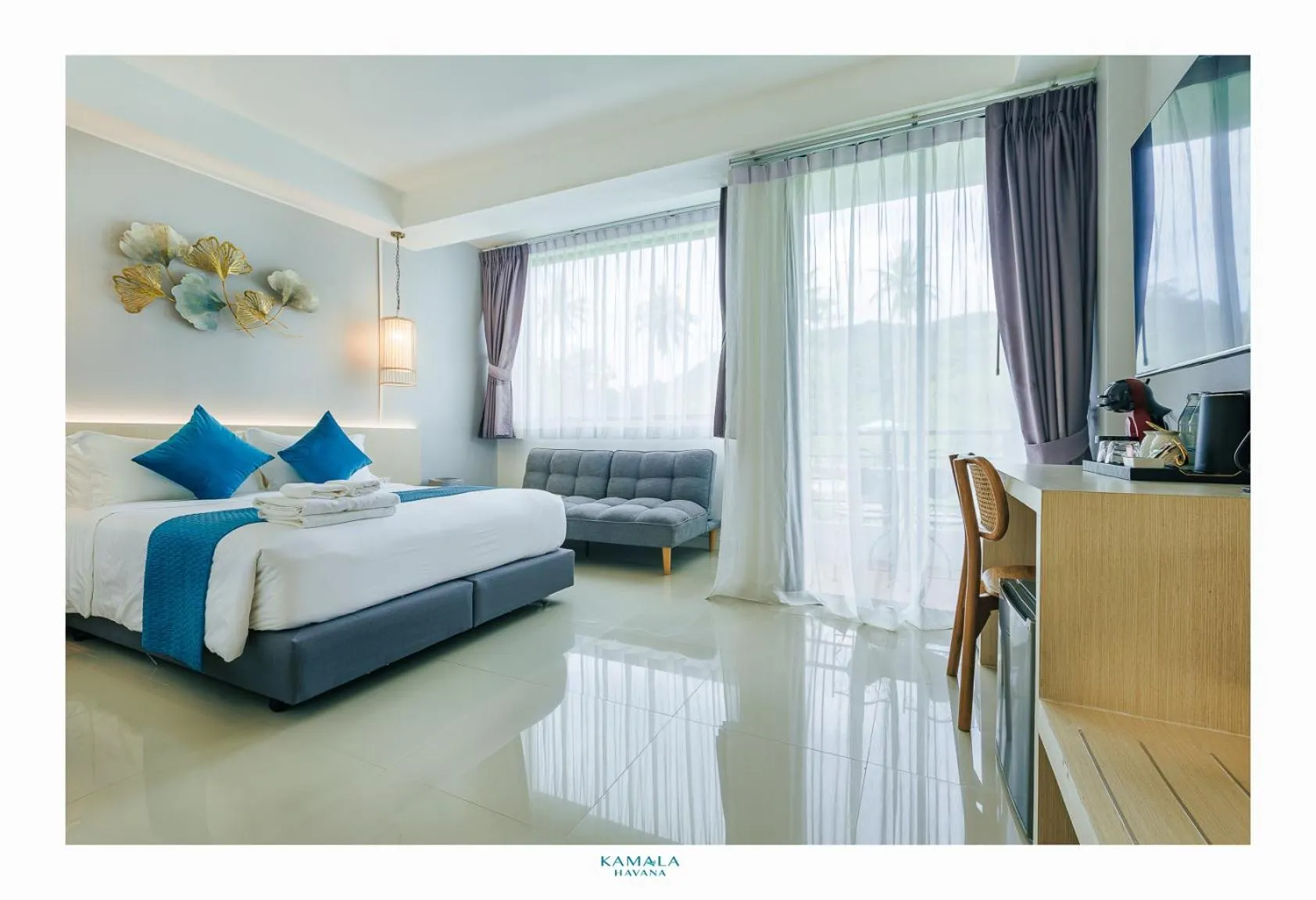 Seating area, Bed in Kamala Havana Hotel and Cafe