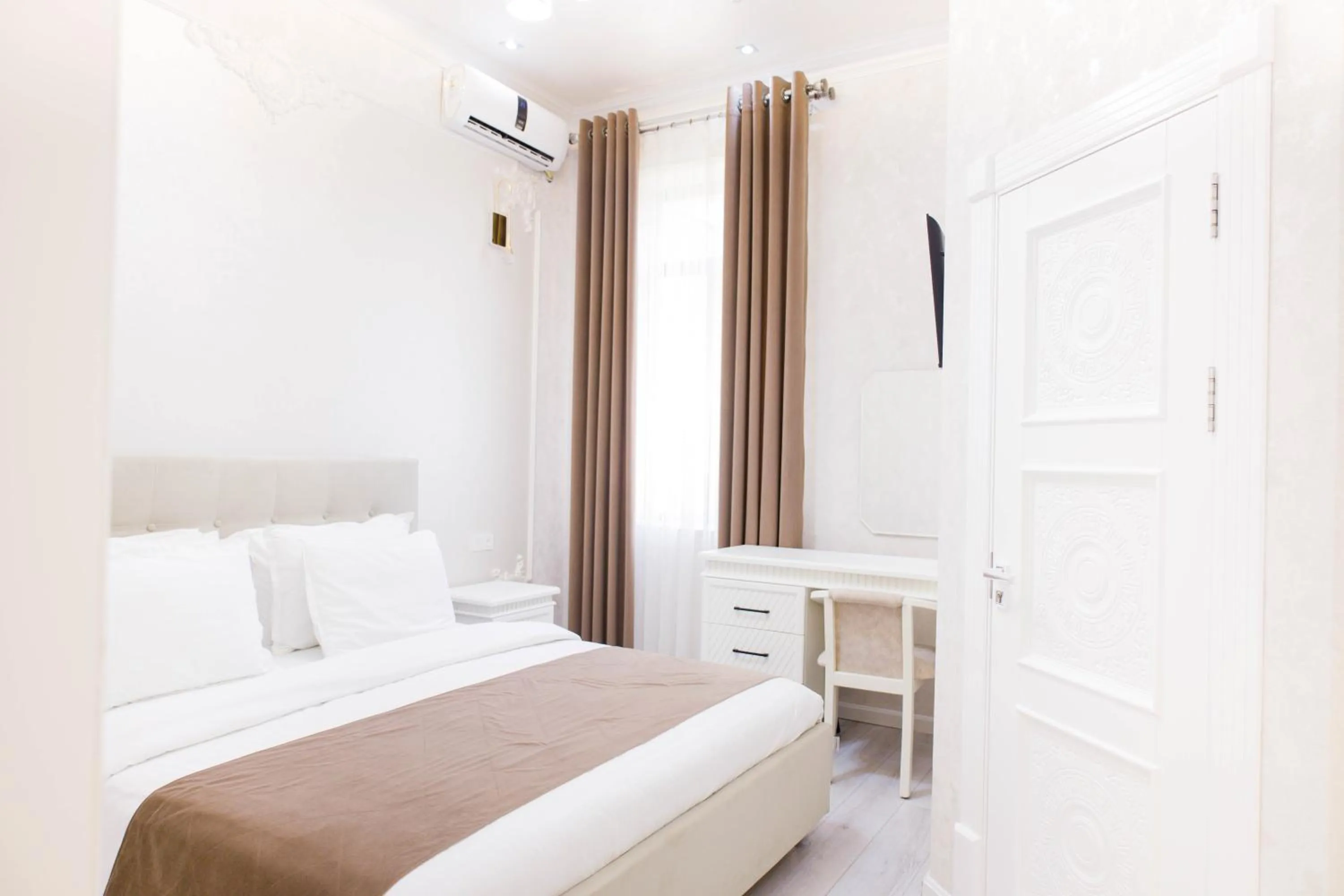 Bed in Hotel Dali Samarkand