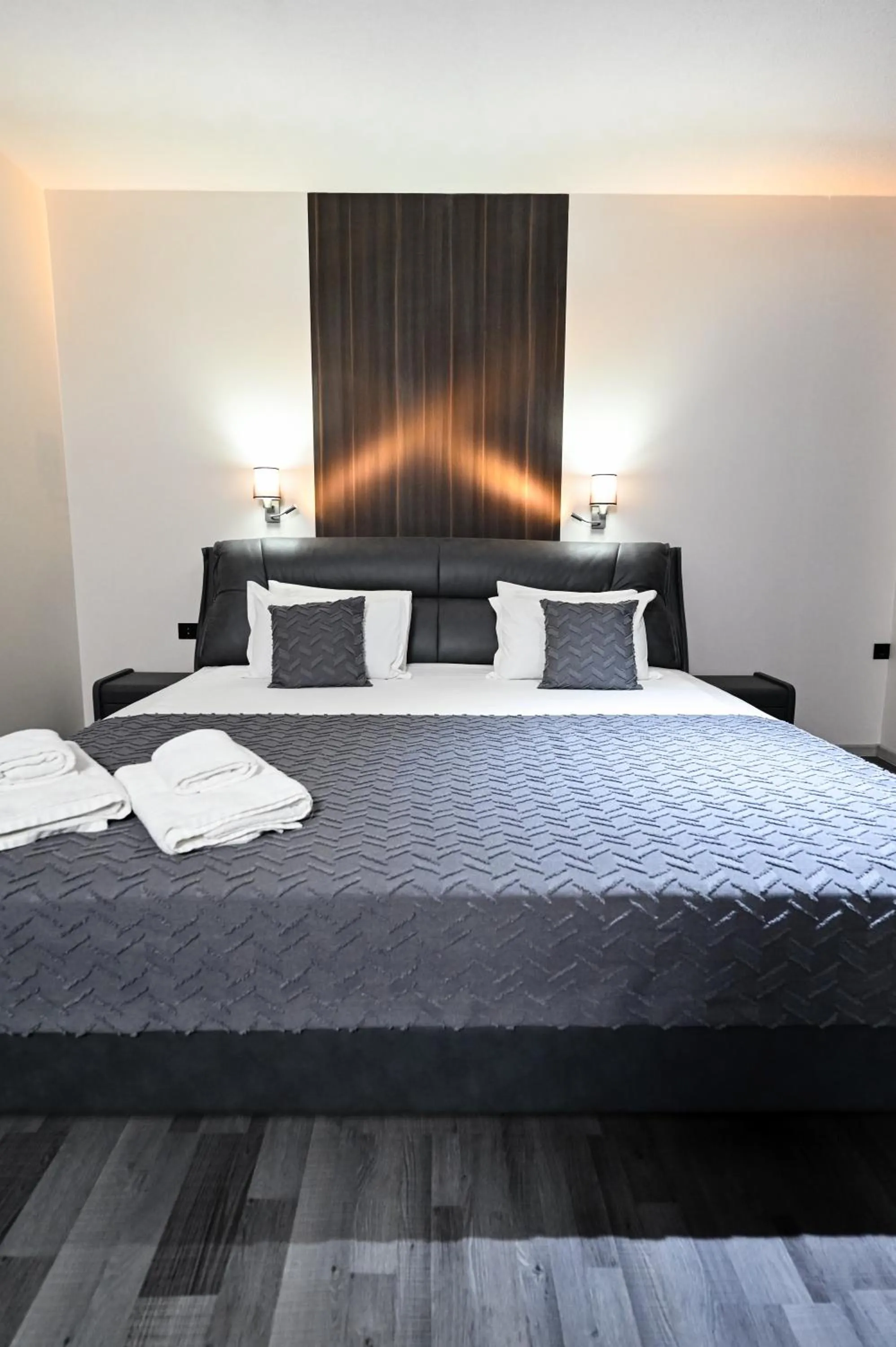 Bed in Grey Star Hotel