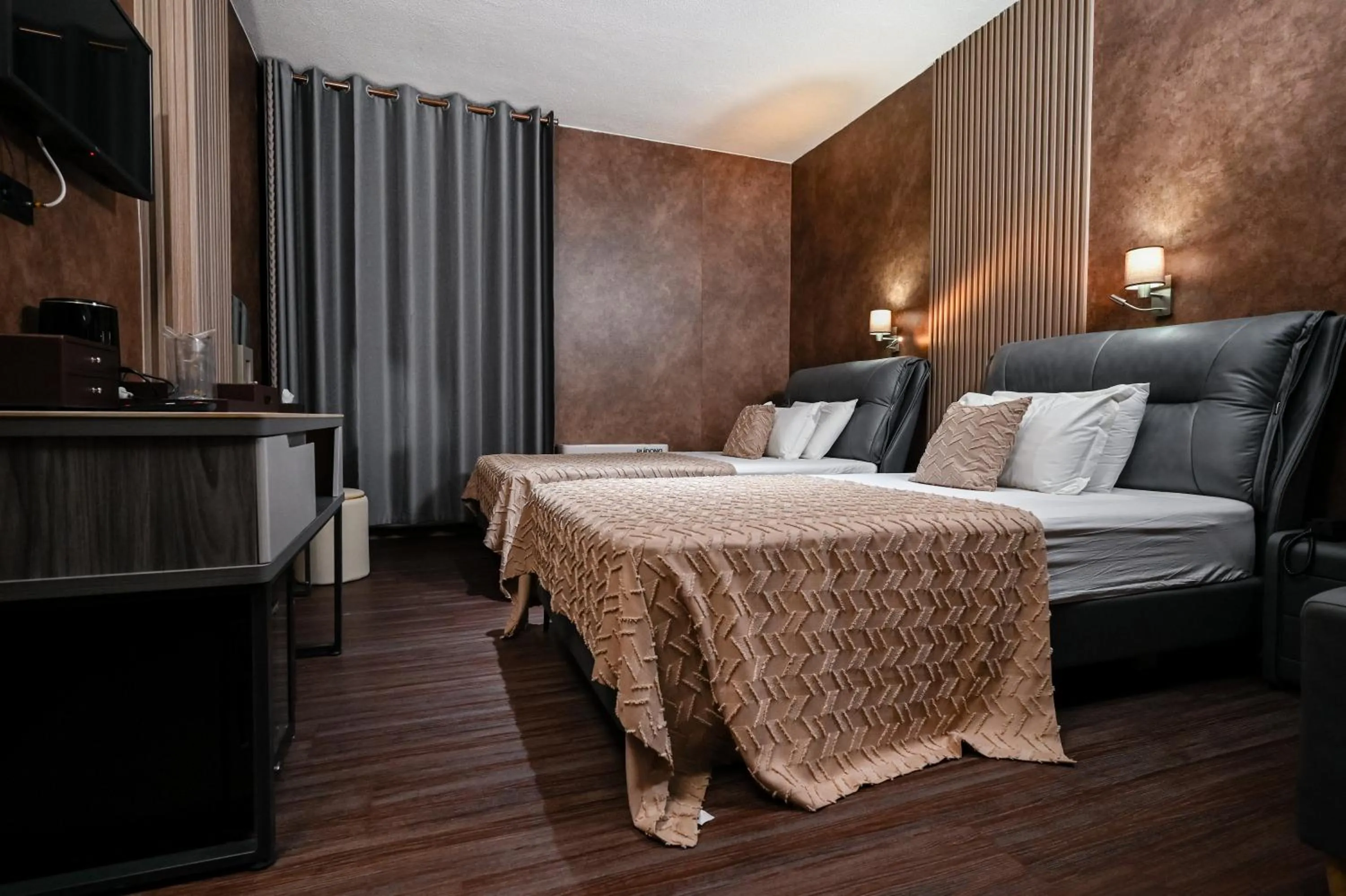 Bed in Grey Star Hotel