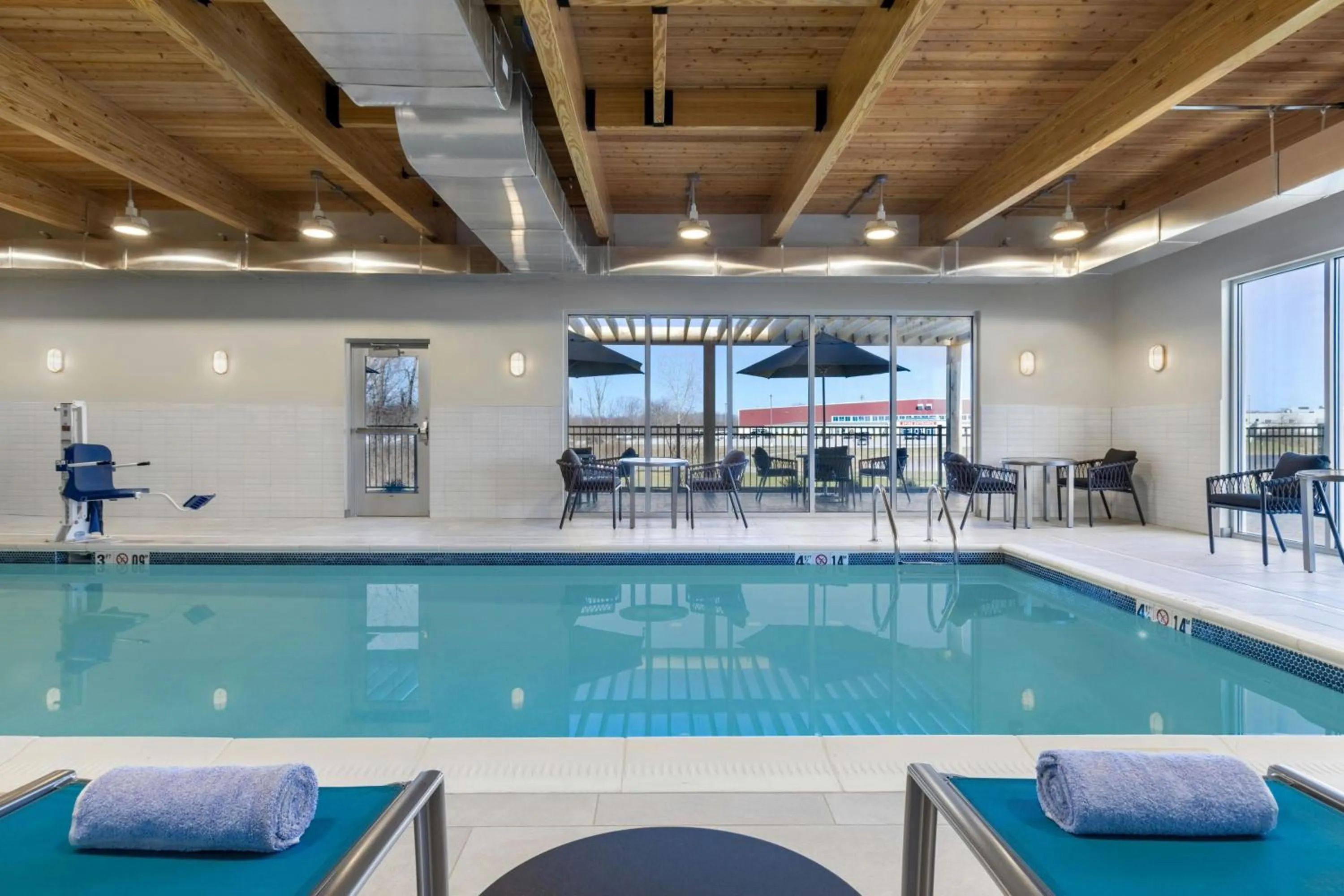 Swimming pool in TownePlace Suites by Marriott Geneva at SPIRE Academy