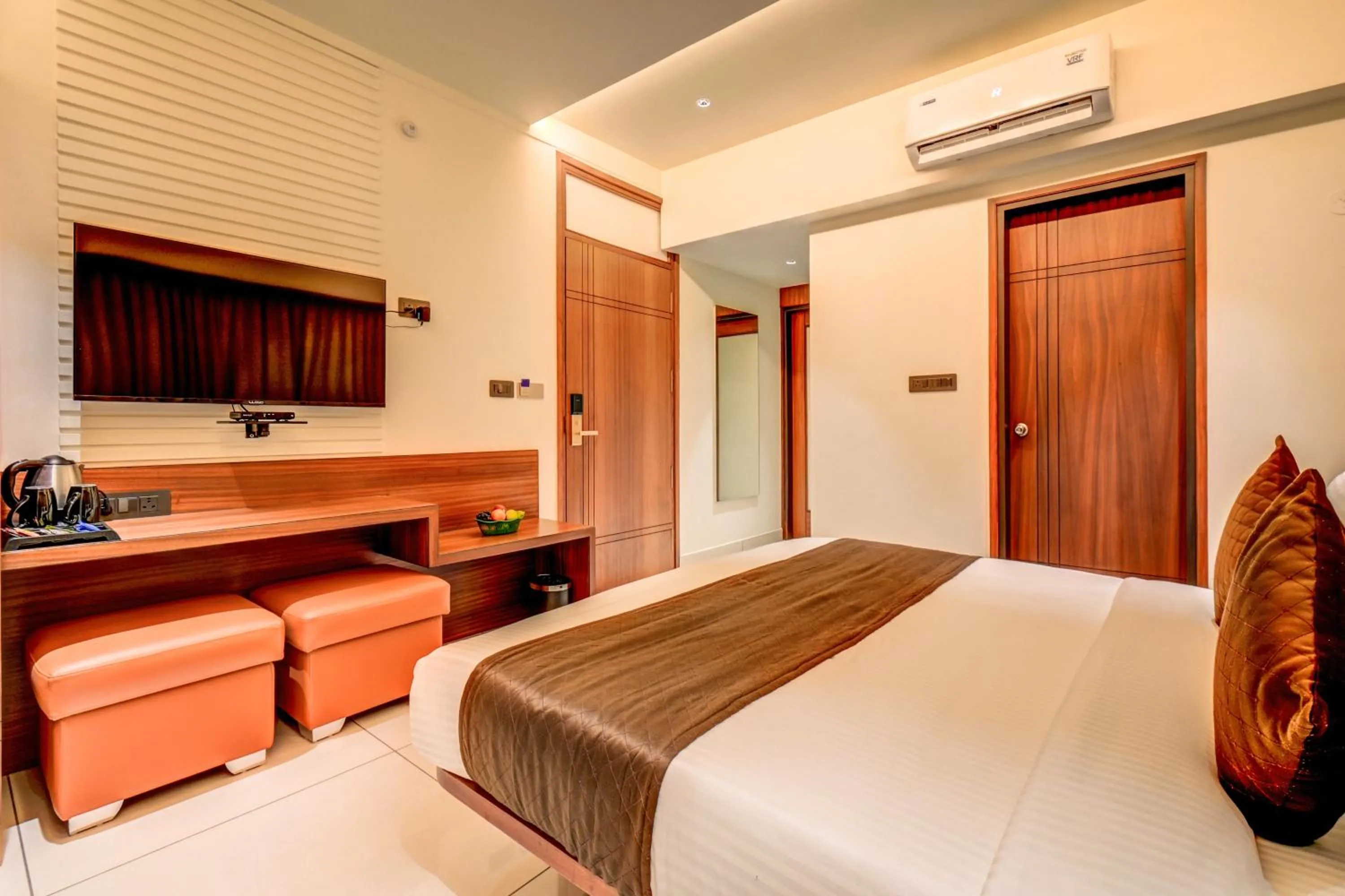 TV and multimedia, Bed in Hotel Hari Govindas Mysore - Explore the Heart of Mysore