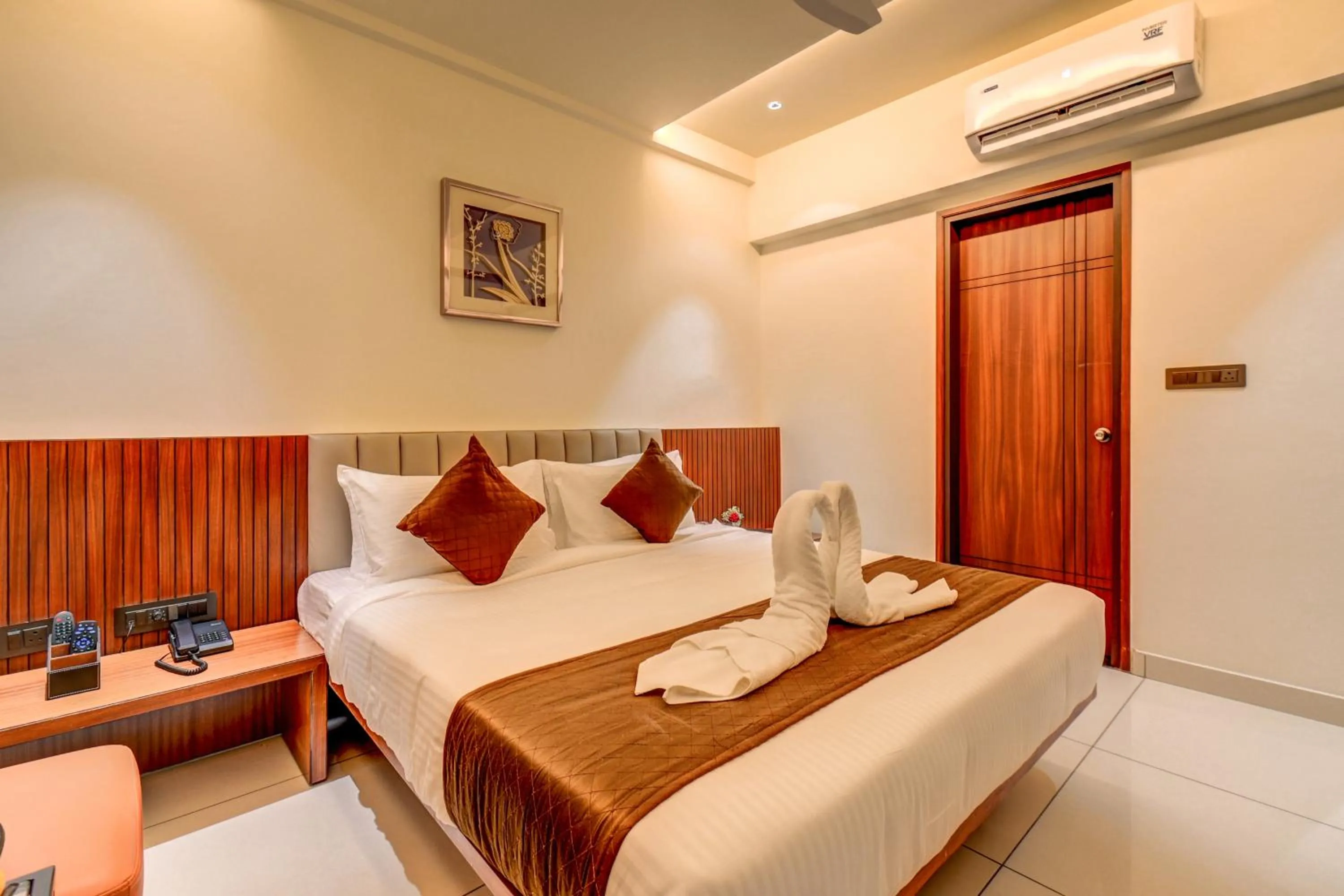 Bed in Hotel Hari Govindas Mysore - Explore the Heart of Mysore