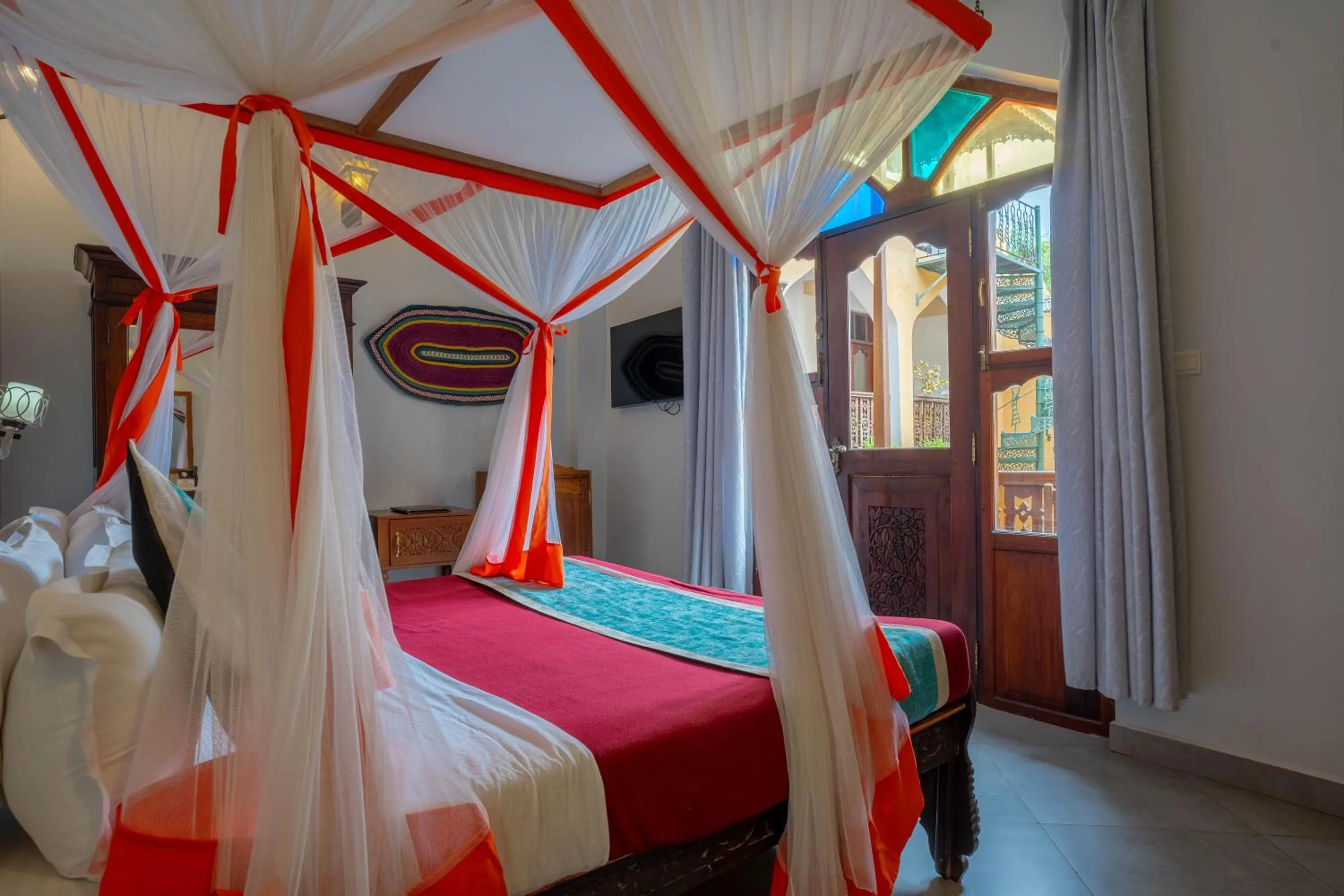 TV and multimedia, Bed in Mizingani Seafront Hotel