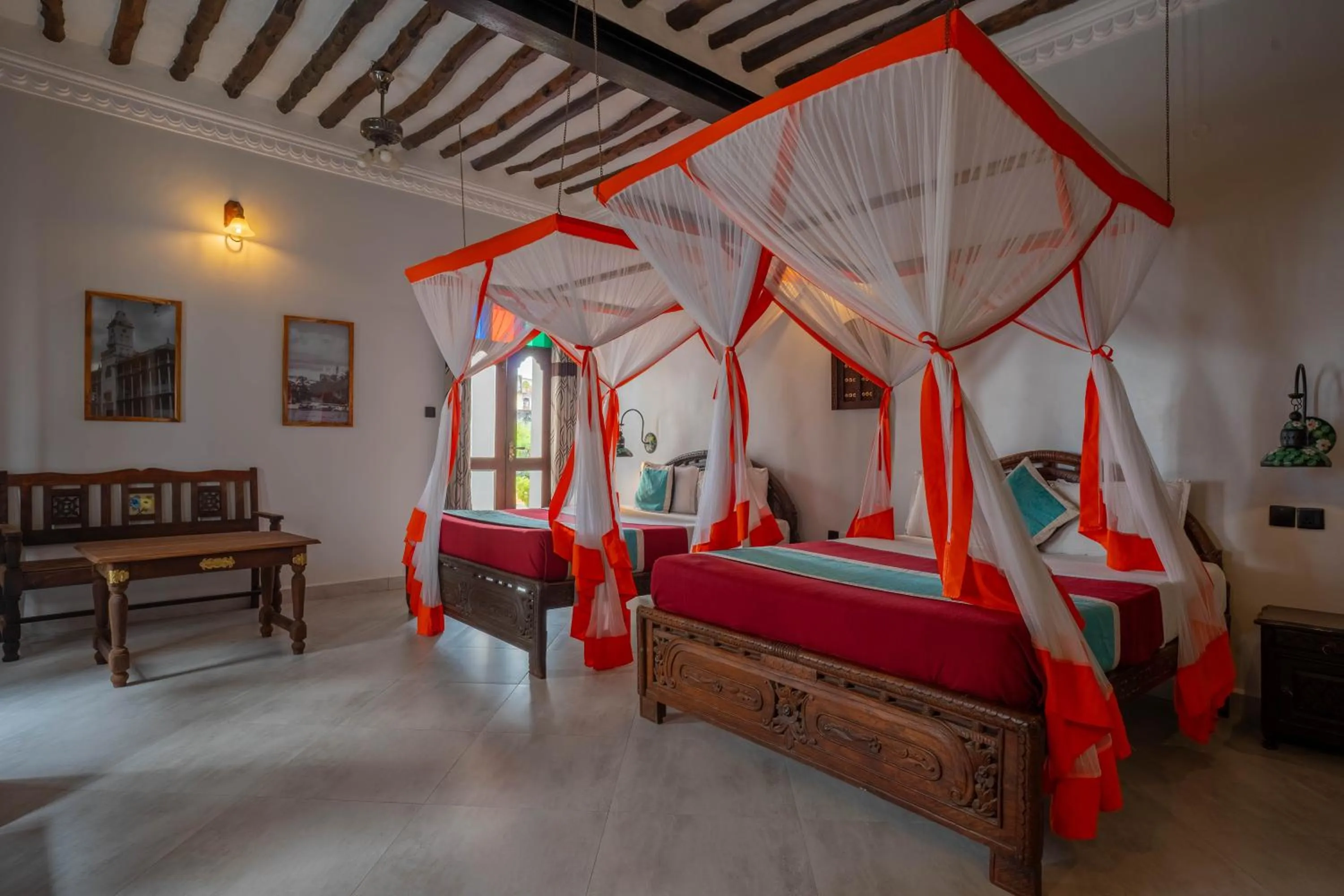 Seating area, Bed in Mizingani Seafront Hotel