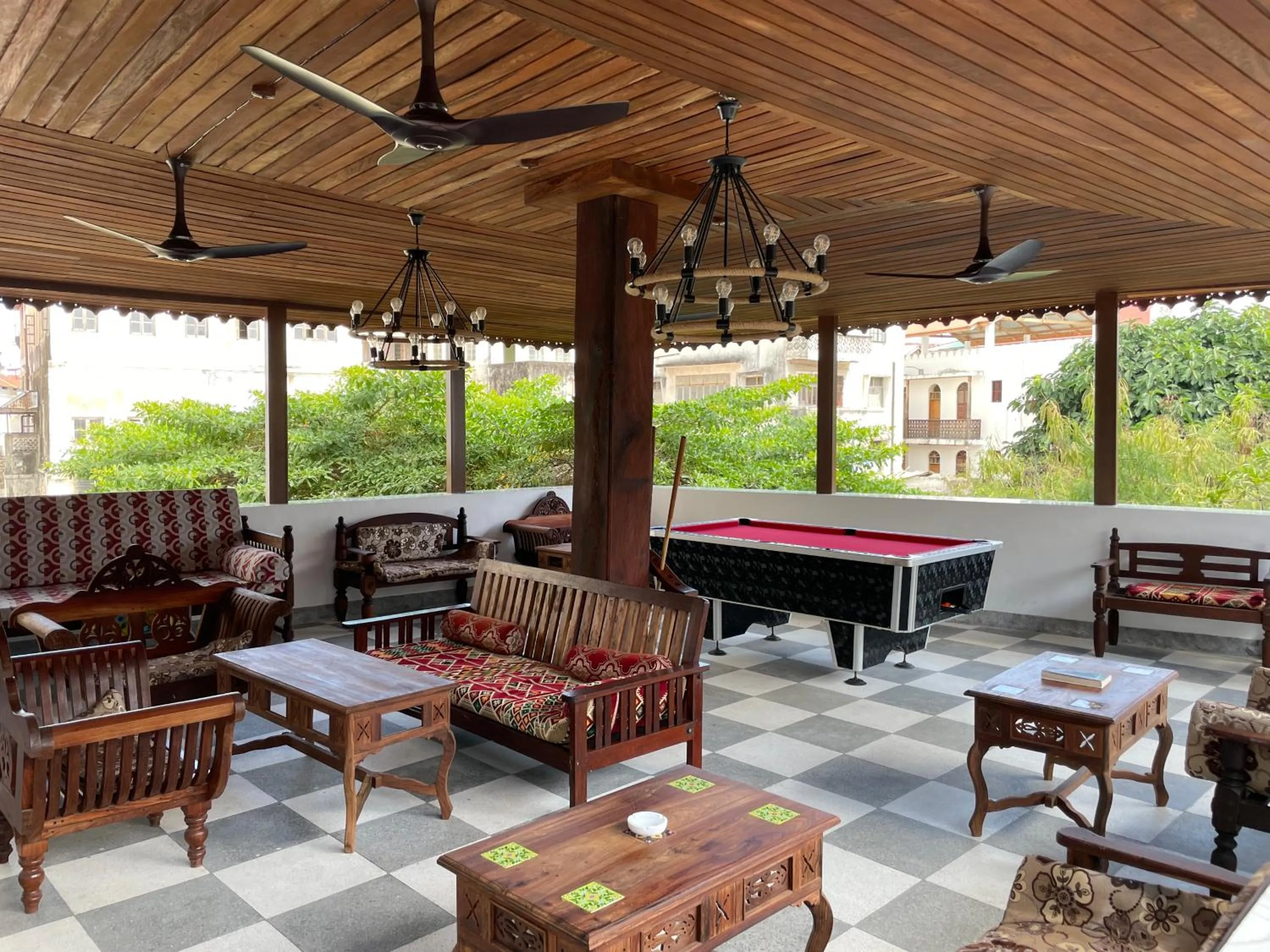 Communal lounge/ TV room in Mizingani Seafront Hotel