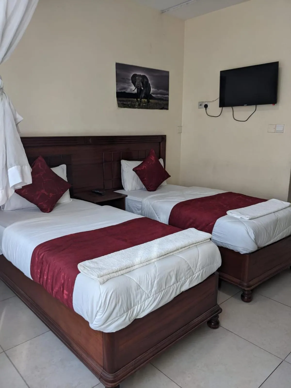 Bed in Epitome Times Hotel
